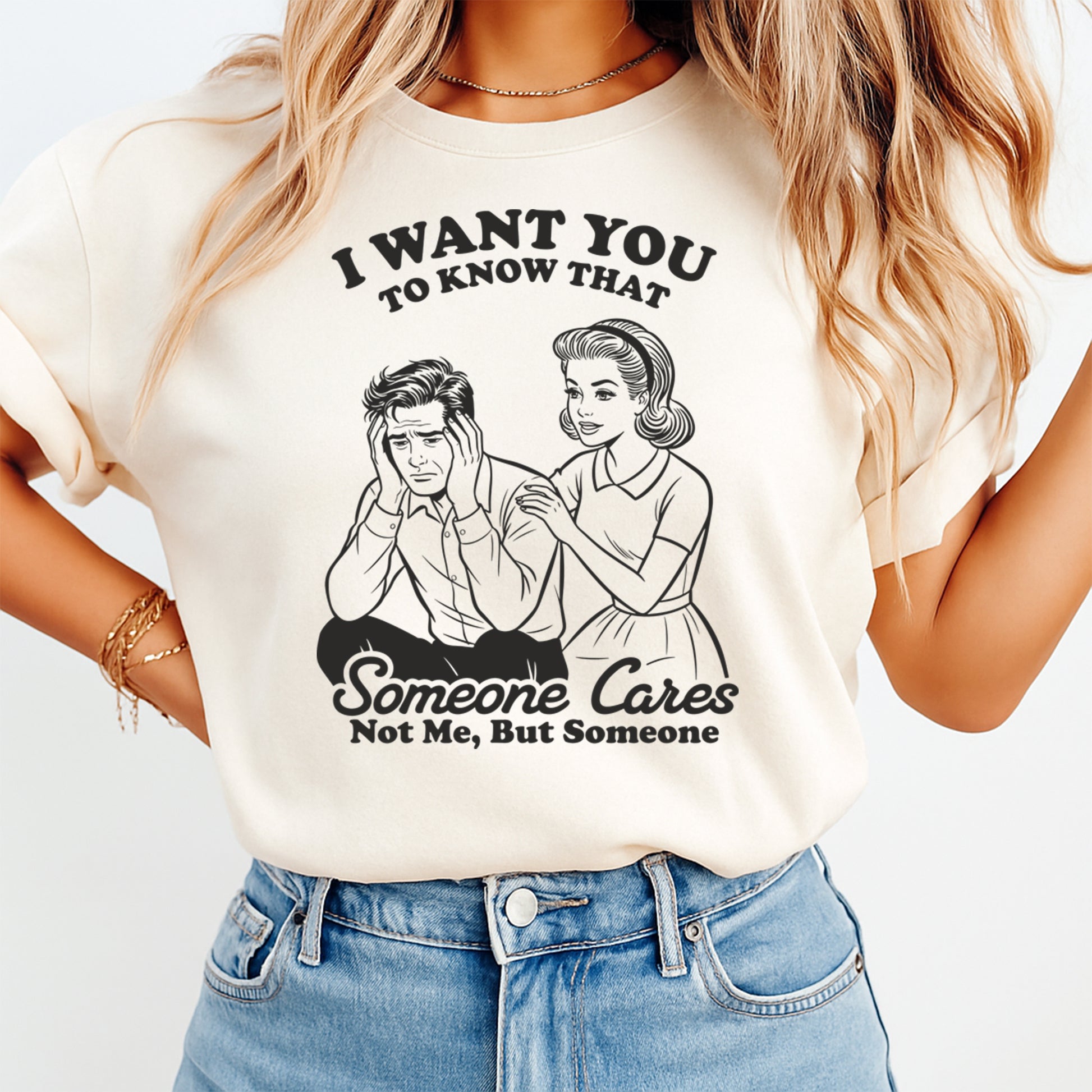 Sarcastic shirt mockup showing I Want You To Know That Someone Cares phrase with retro couple illustration on light colored tee