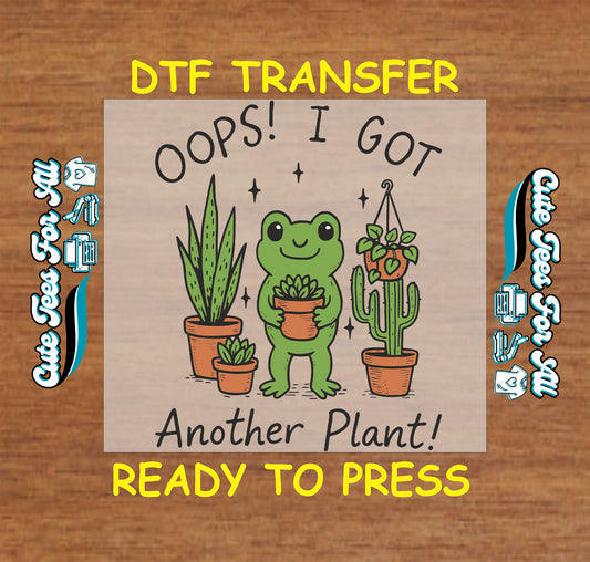 Funny ready to press dtf transfer with Oops I Got Another Plant text featuring frog holding potted plant and houseplants for DIY funny shirts