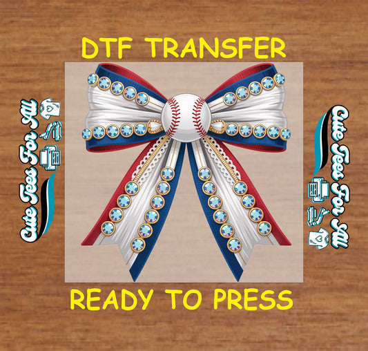 Ready to press dtf transfer artwork featuring patriotic baseball bow with red white blue ribbons rhinestone accents and stitched baseball center for diy baseball shirts.