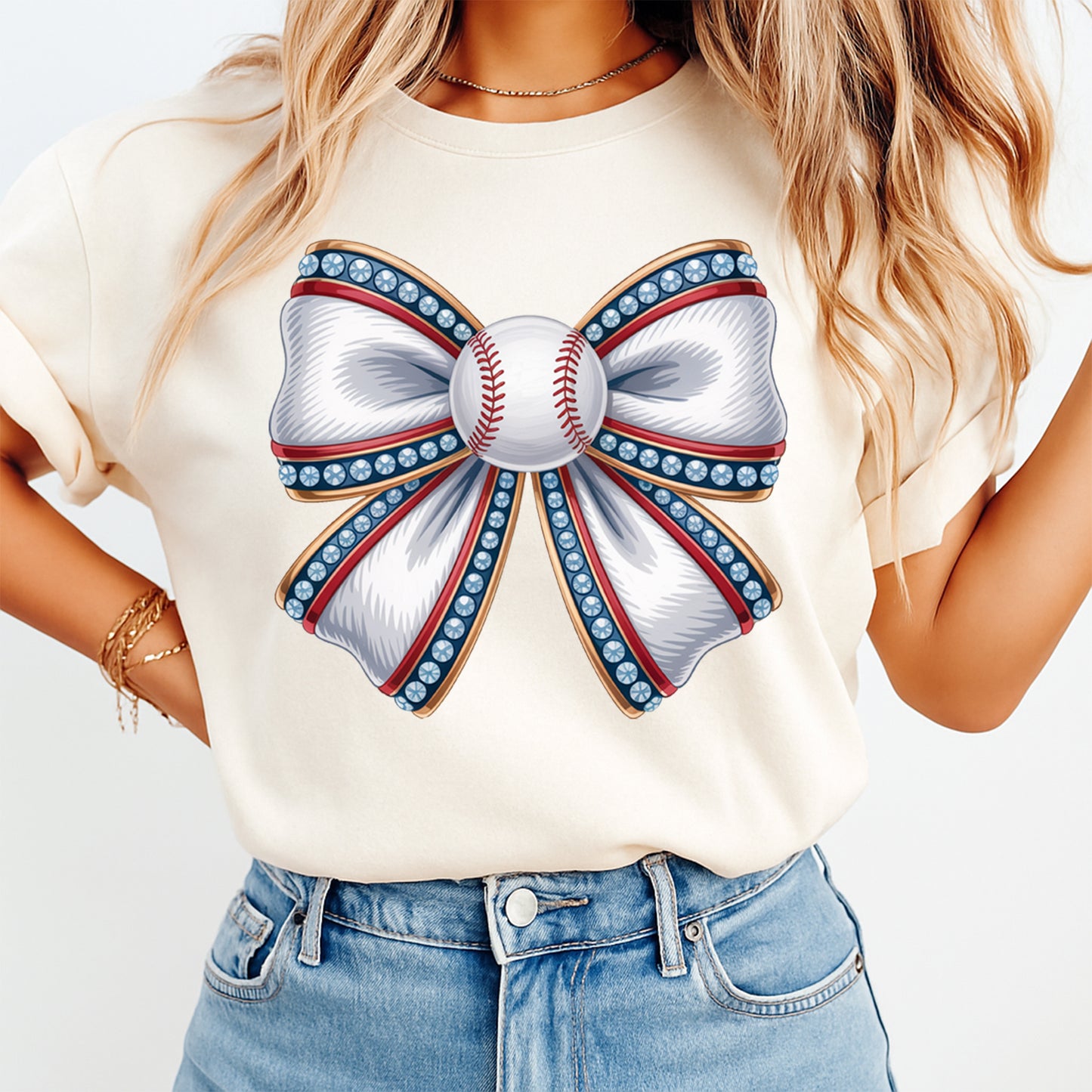 Cream shirt mockup featuring a baseball bow graphic with rhinestone style accents and stitched baseball center for sports themed apparel