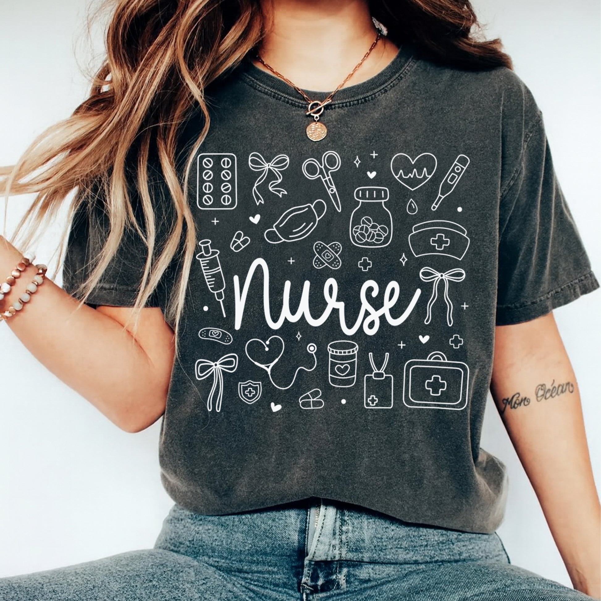 Nurse shirt mockup featuring white doodle style medical icons and nurse typography for diy nurse shirts