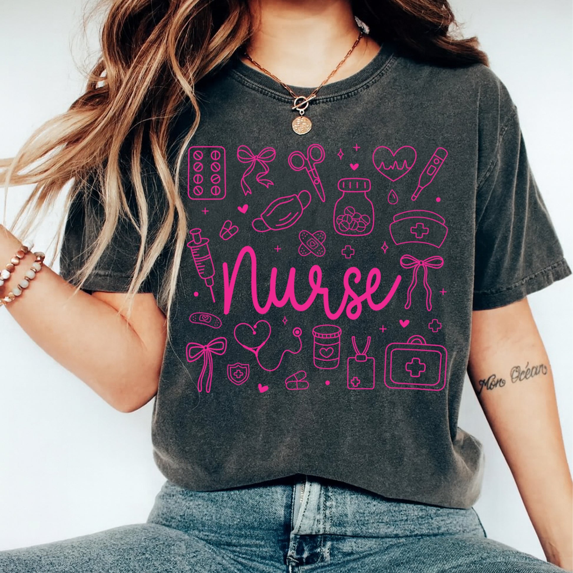 Dark shirt mockup showing nurse script medical icons heat transfer design pressed on shirt