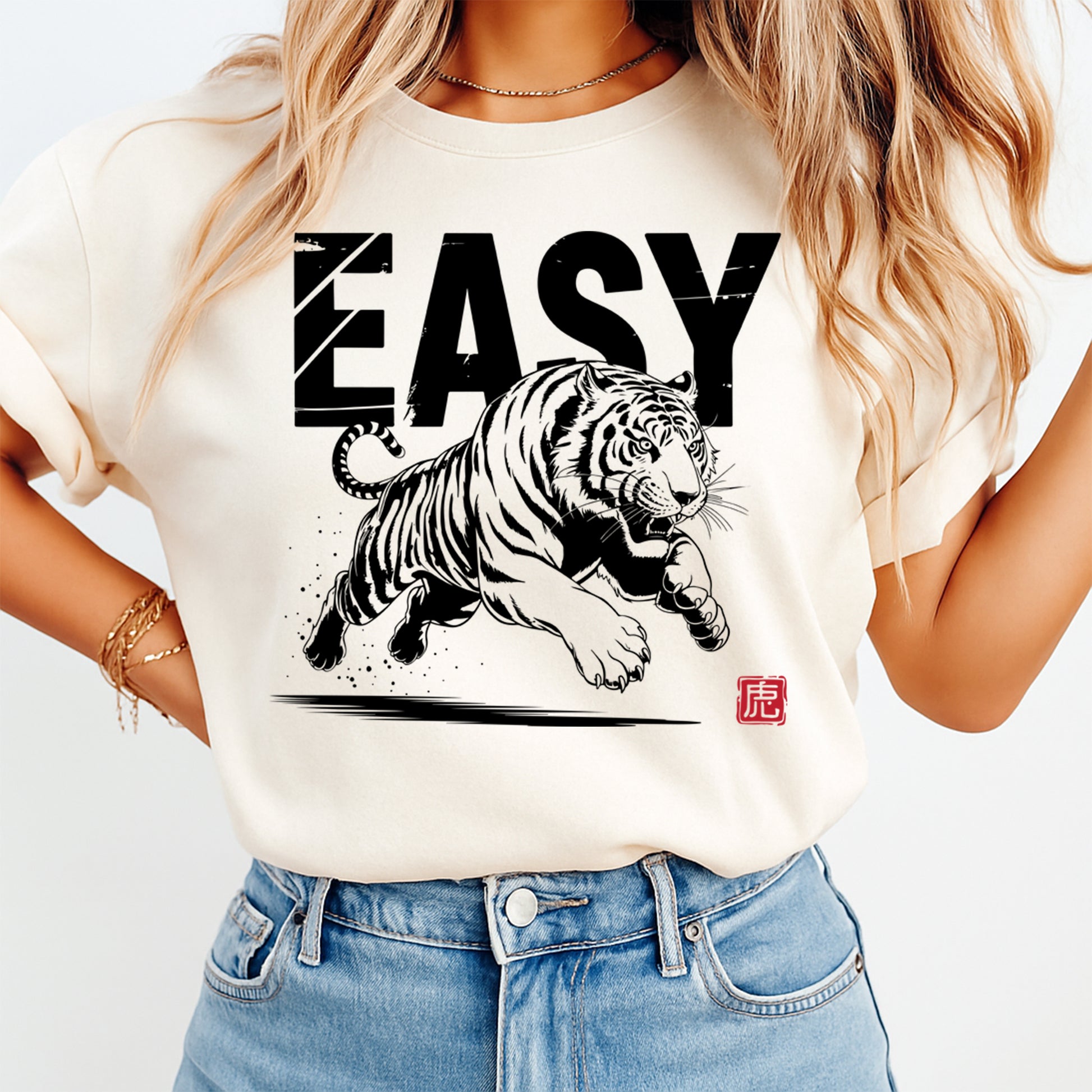 Cream t shirt mockup featuring easy text with jumping tiger graphic applied using ready to press dtf transfer