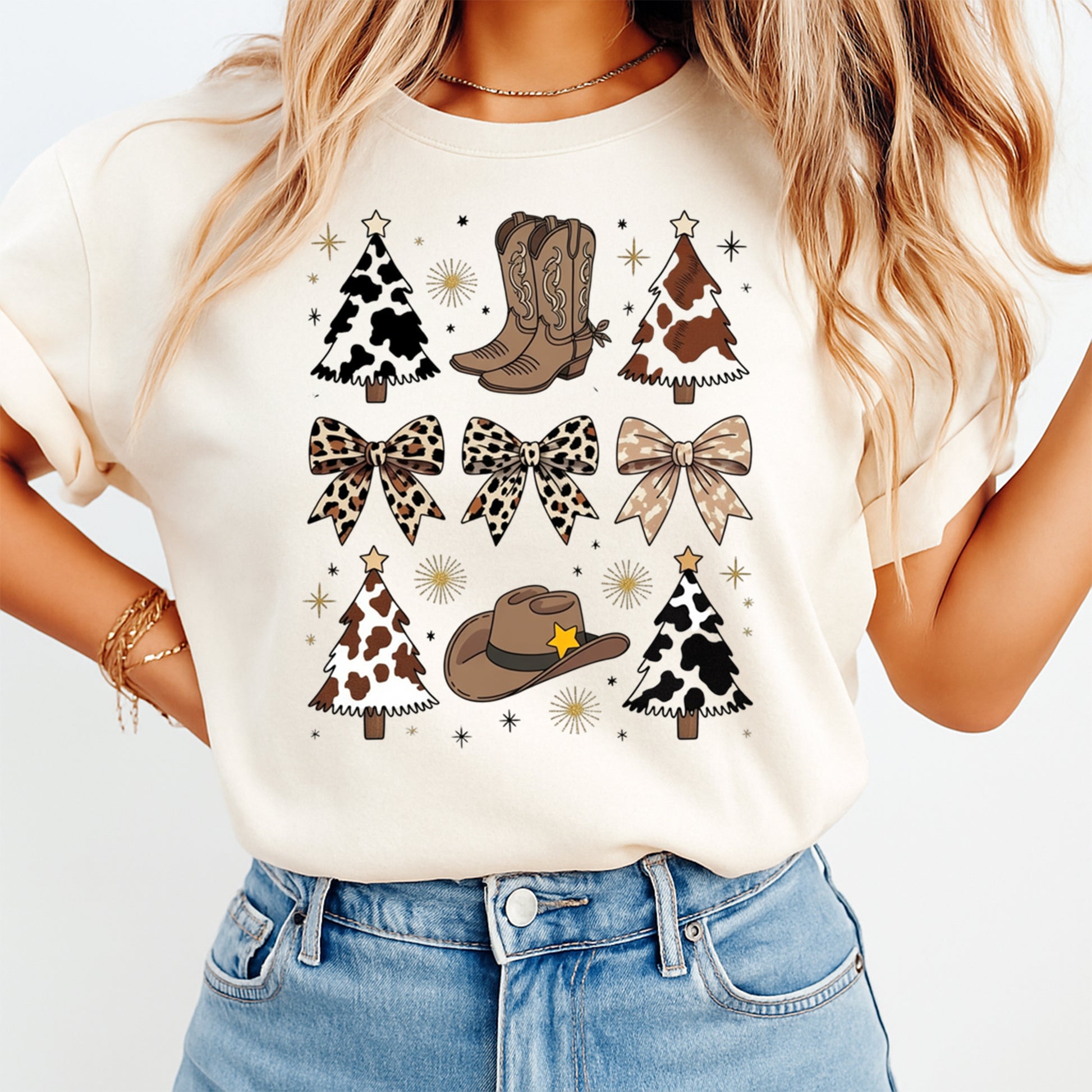 Cream t shirt mockup showing western christmas cow print dtf transfer with rustic holiday icons and neutral tones