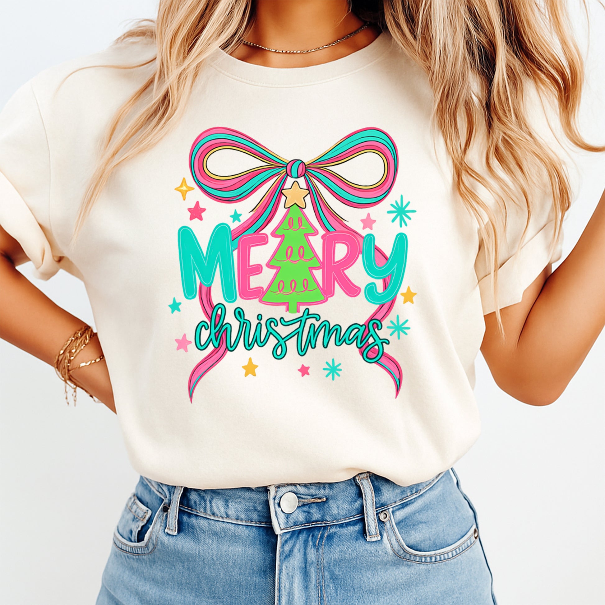 Cream t shirt mockup showing merry christmas dtf transfer with bright bow ribbon tree and playful holiday stars