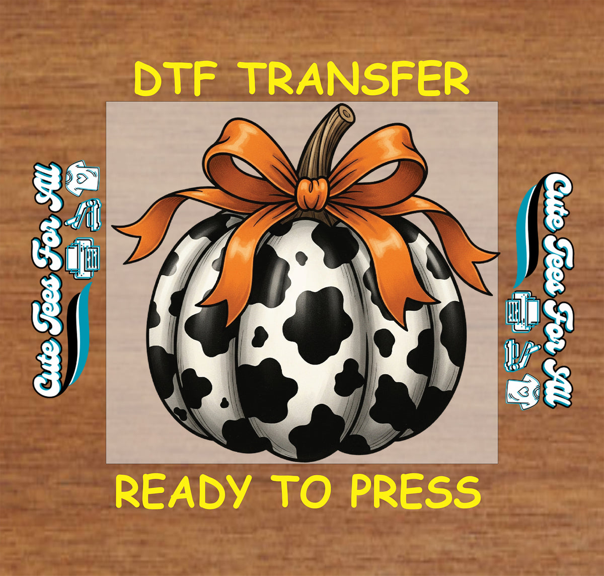A DTF transfer design featuring a black and white cow-print pumpkin with an orange ribbon, centered on a wood-textured background with yellow text reading 'DTF TRANSFER' and 'READY TO PRESS'.