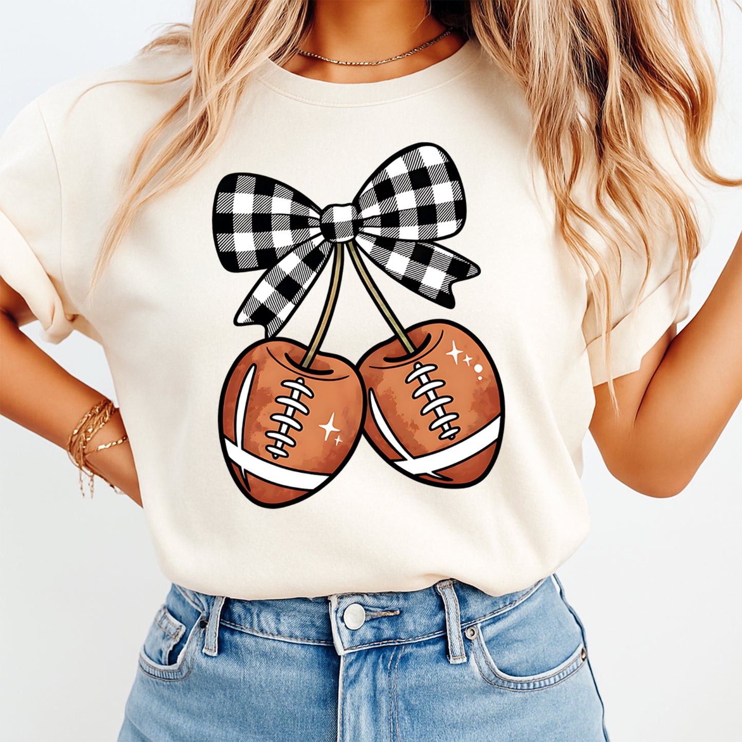 Football cherry bow graphic shown on shirt mockup for football season and game day apparel