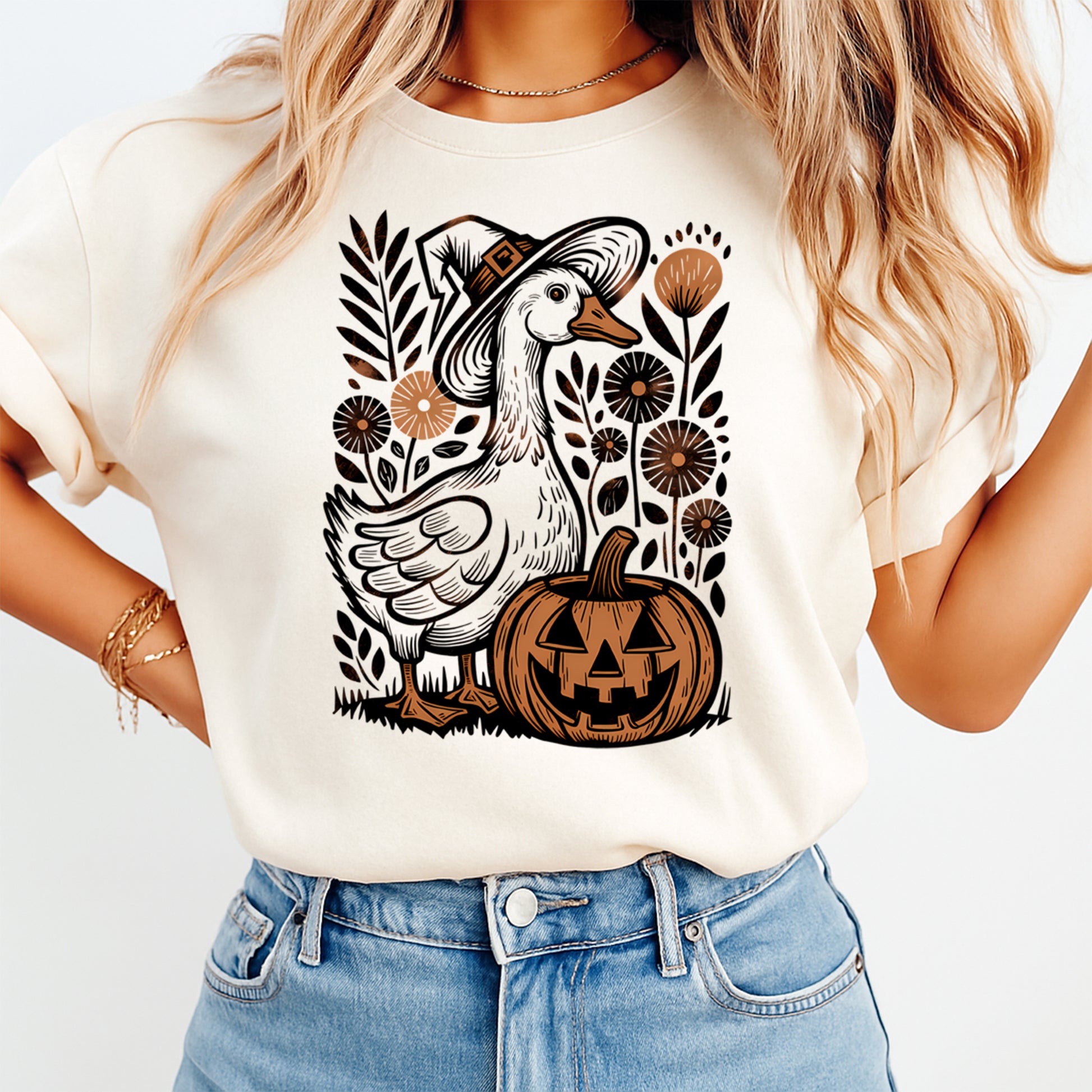 Goose pumpkin Halloween graphic displayed on shirt mockup for fall and Halloween season apparel