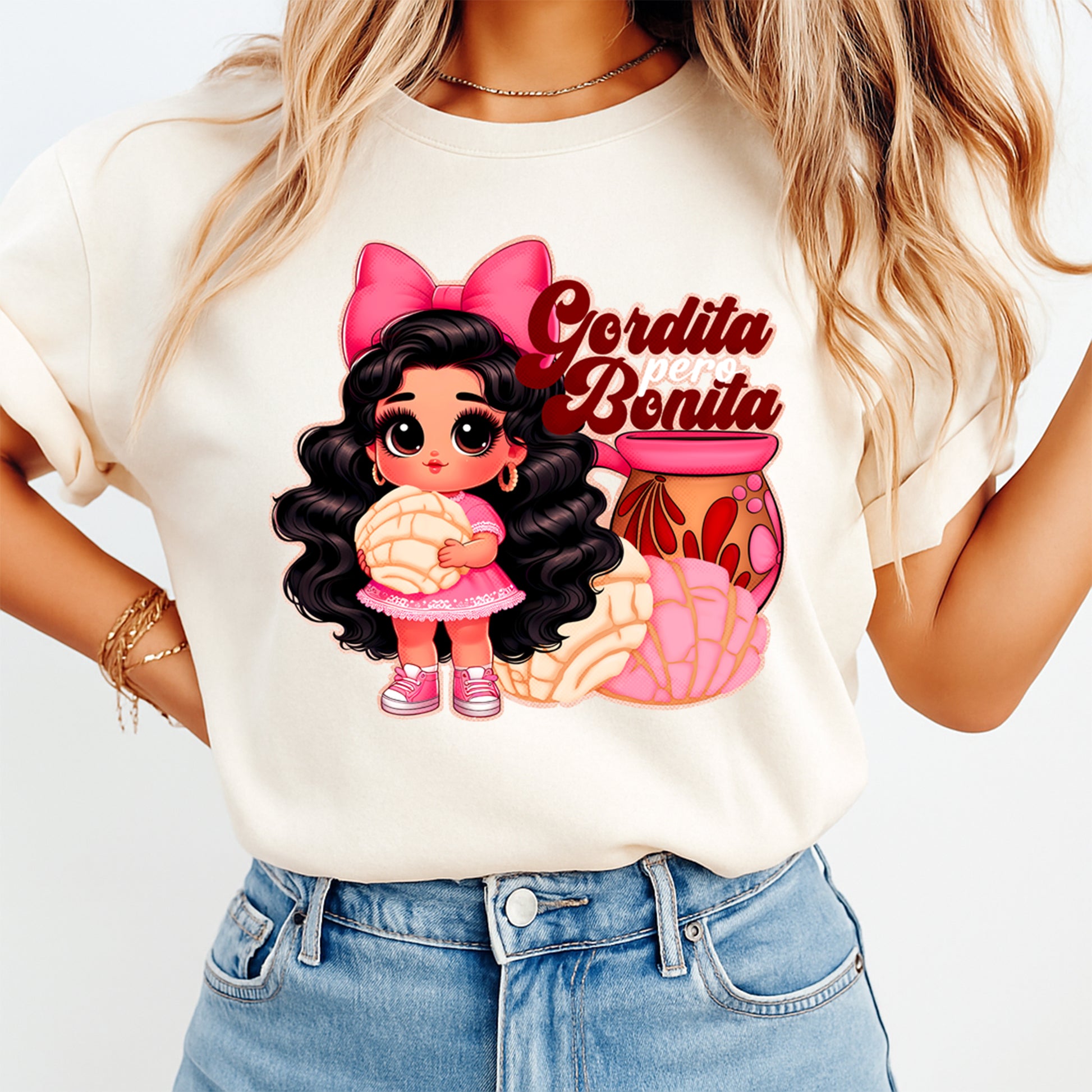 Gordita pero bonita graphic shown on shirt mockup with pan dulce character illustration