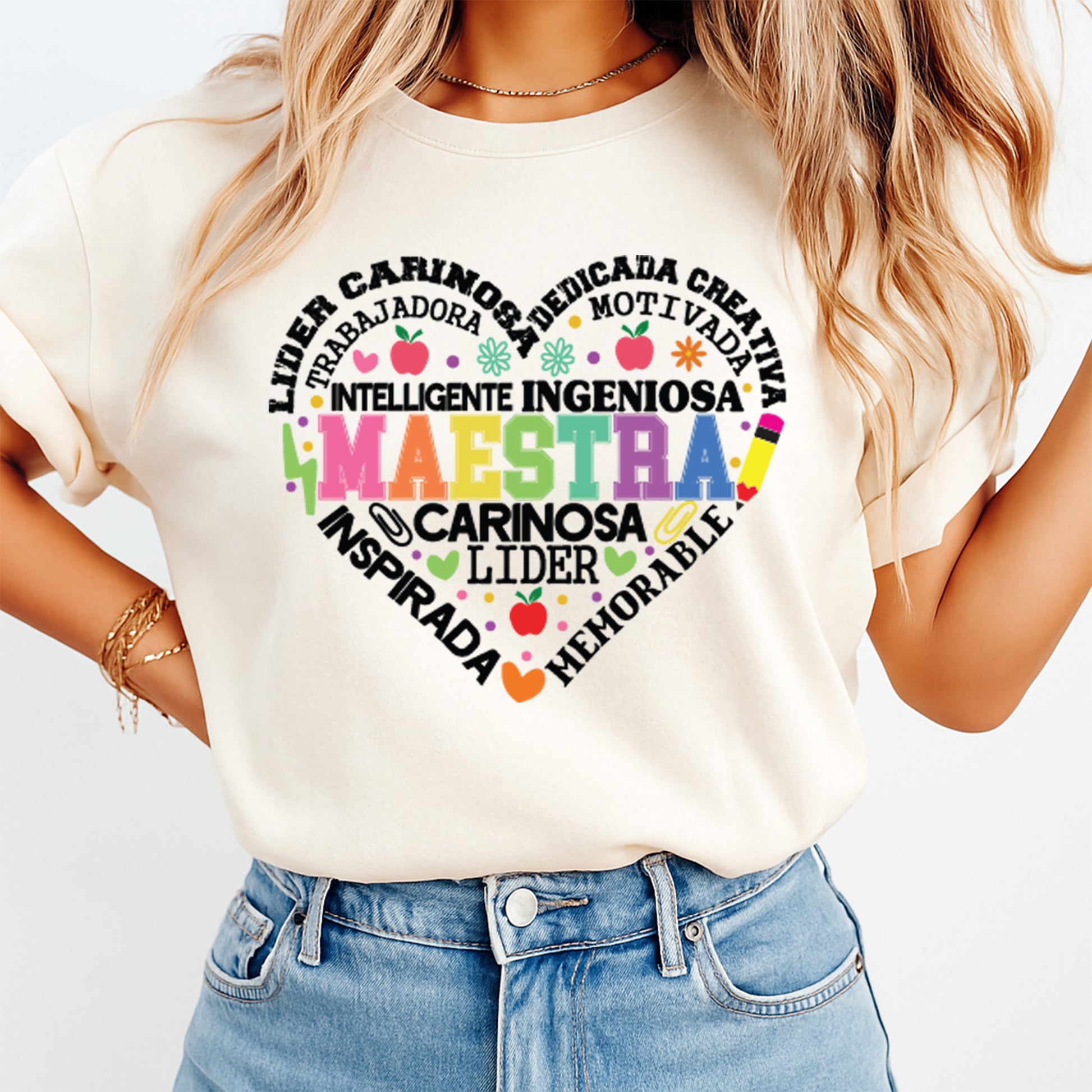 Maestra Spanish teacher heart word art design displayed on light color t shirt mockup with colorful classroom inspired artwork