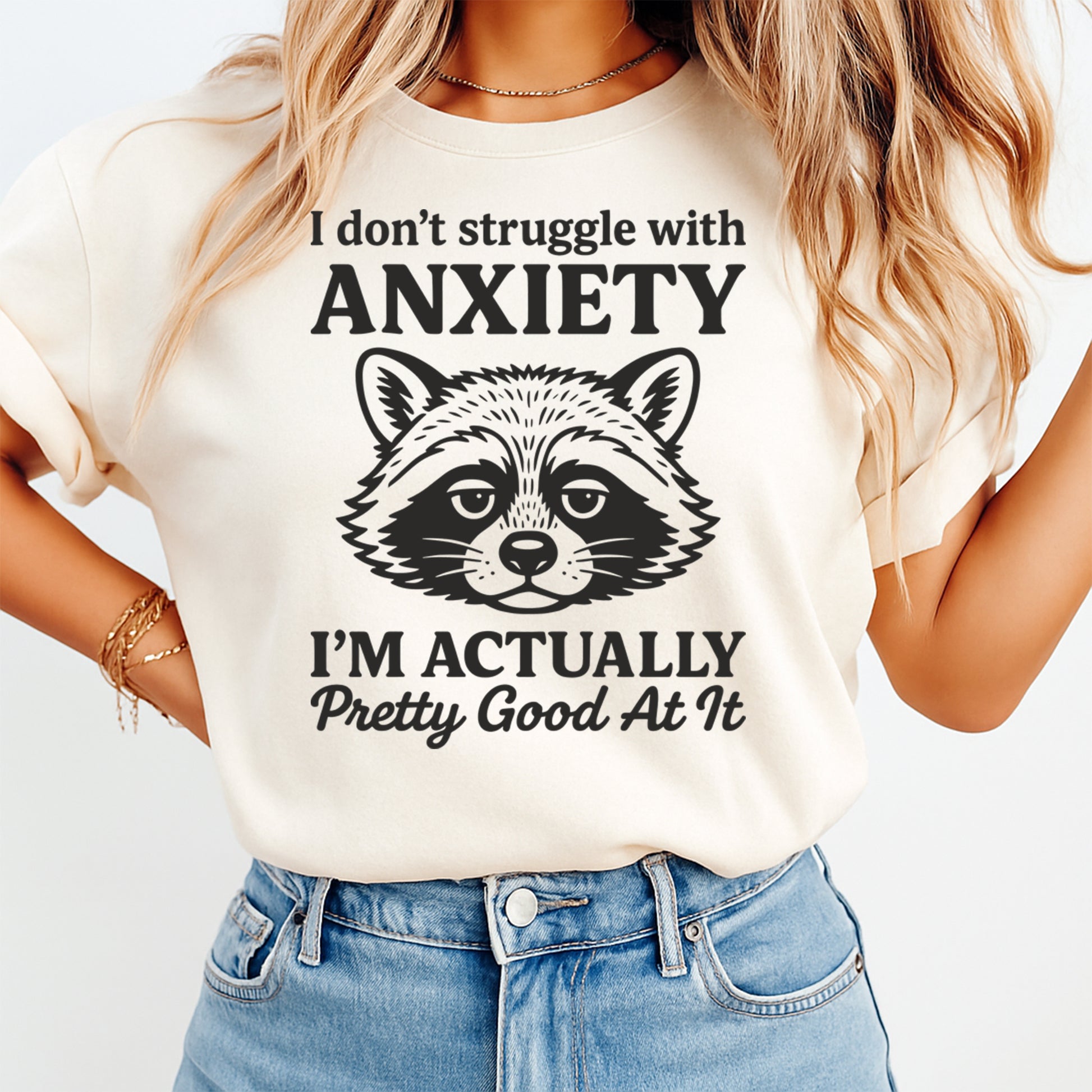 Funny raccoon anxiety quote design displayed on light color t shirt mockup with bold sarcastic typography