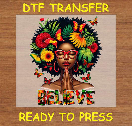"Believe DTF transfer with Afro floral design, flowers, butterflies, and inspirational text for cultural pride"