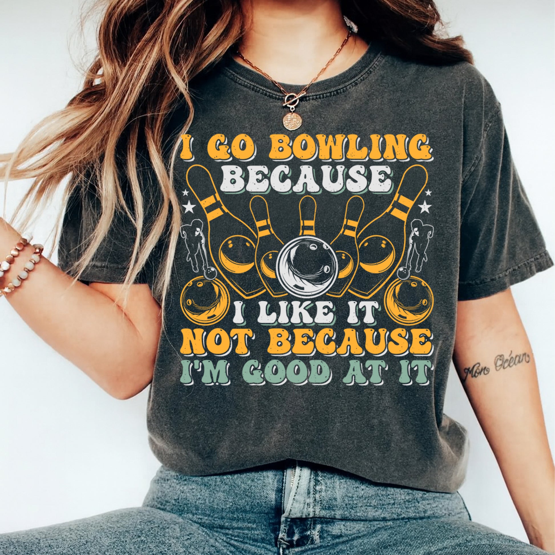 Bowling humor graphic shirt mockup featuring bowling pins and bowling ball with funny bowling phrase displayed on apparel