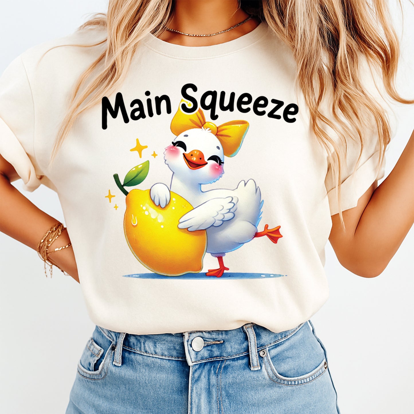 Woman wearing cream shirt with Main Squeeze duck lemon Valentine graphic ready to press dtf heat transfer design