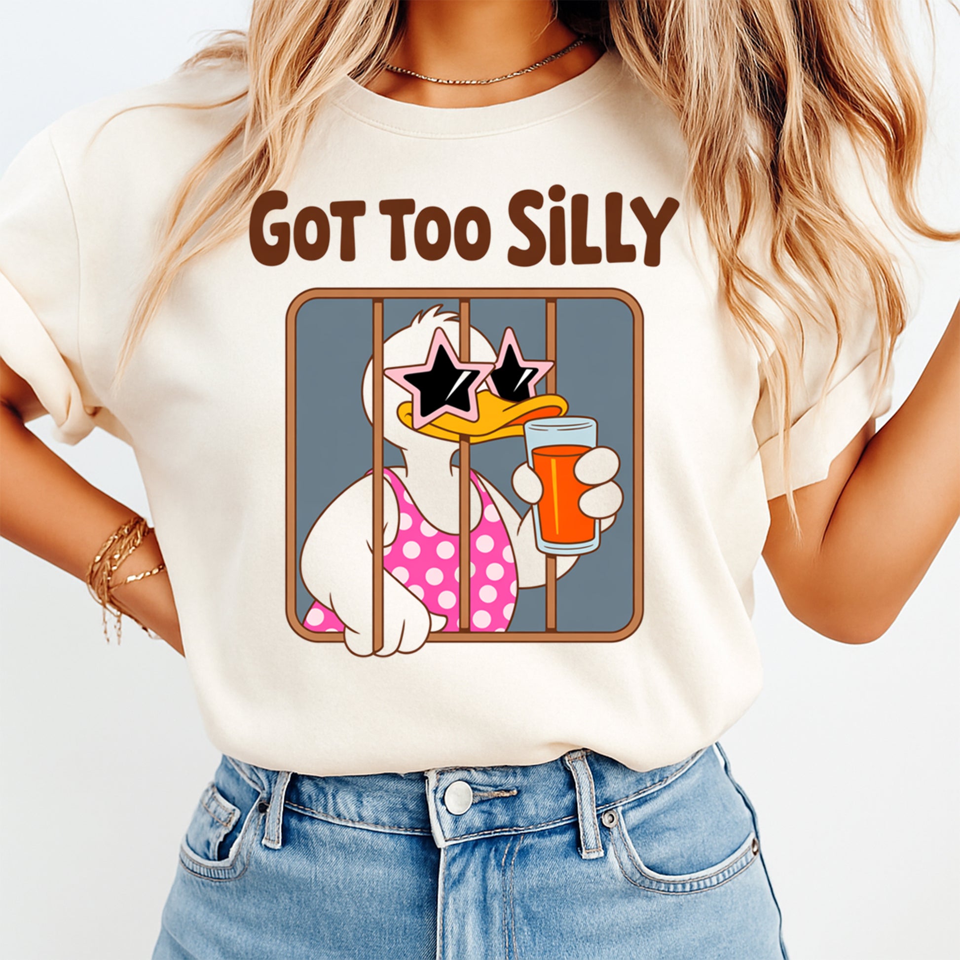 Person wearing a t-shirt with a cartoon character holding a glass of beer and text 'GOT TOO SILLY'.