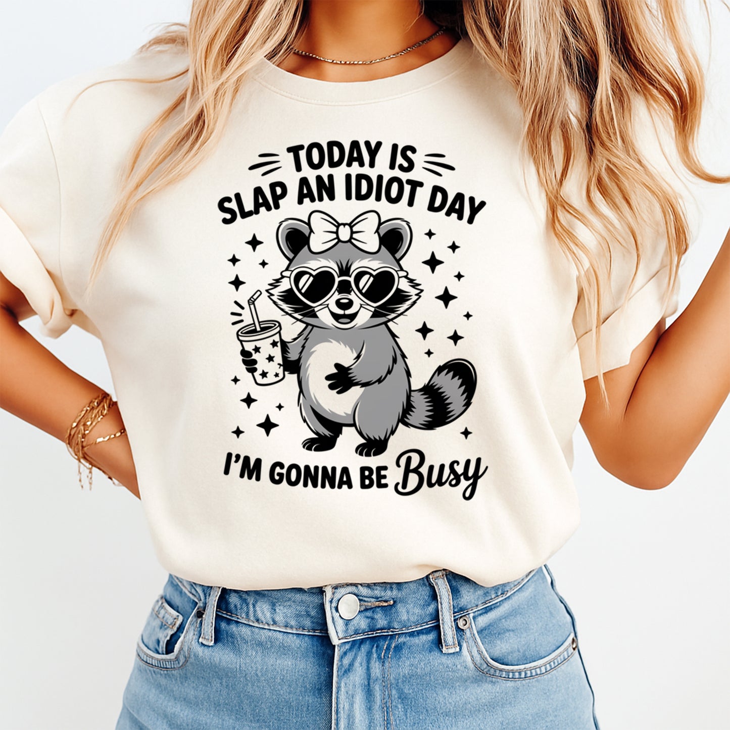 Today Is Slap An Idiot Day raccoon graphic printed on t shirt with humorous sarcastic design
