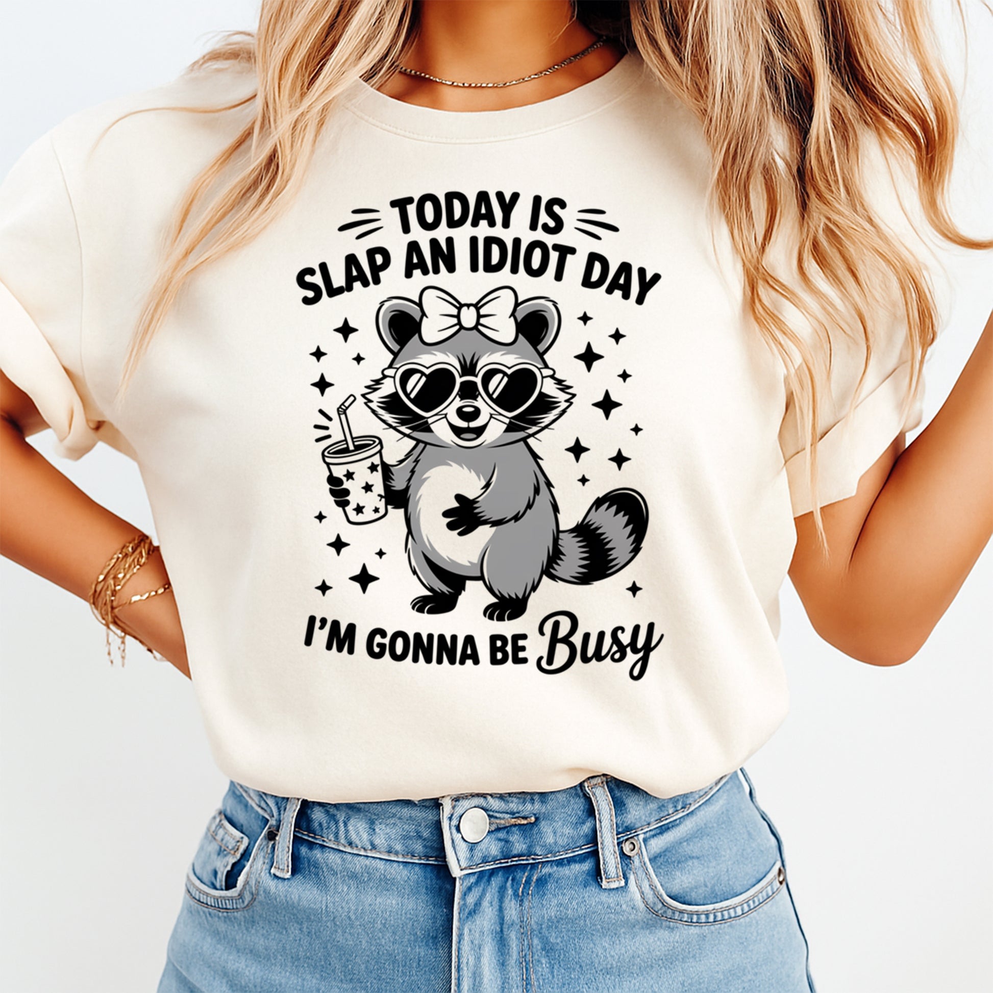 Today Is Slap An Idiot Day raccoon graphic printed on t shirt with humorous sarcastic design