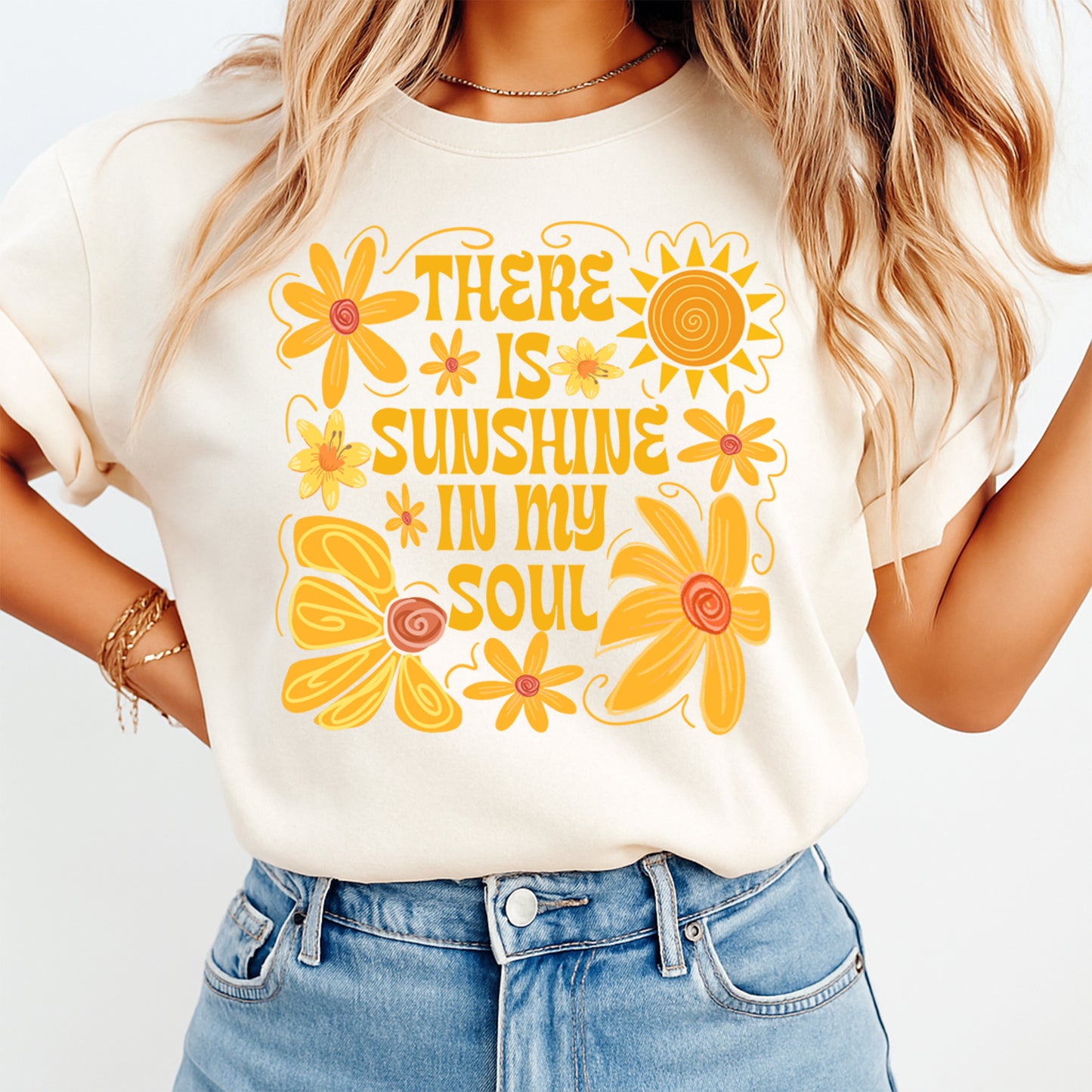 Woman wearing beige shirt with retro floral sunshine quote graphic heat transfer design pressed on front