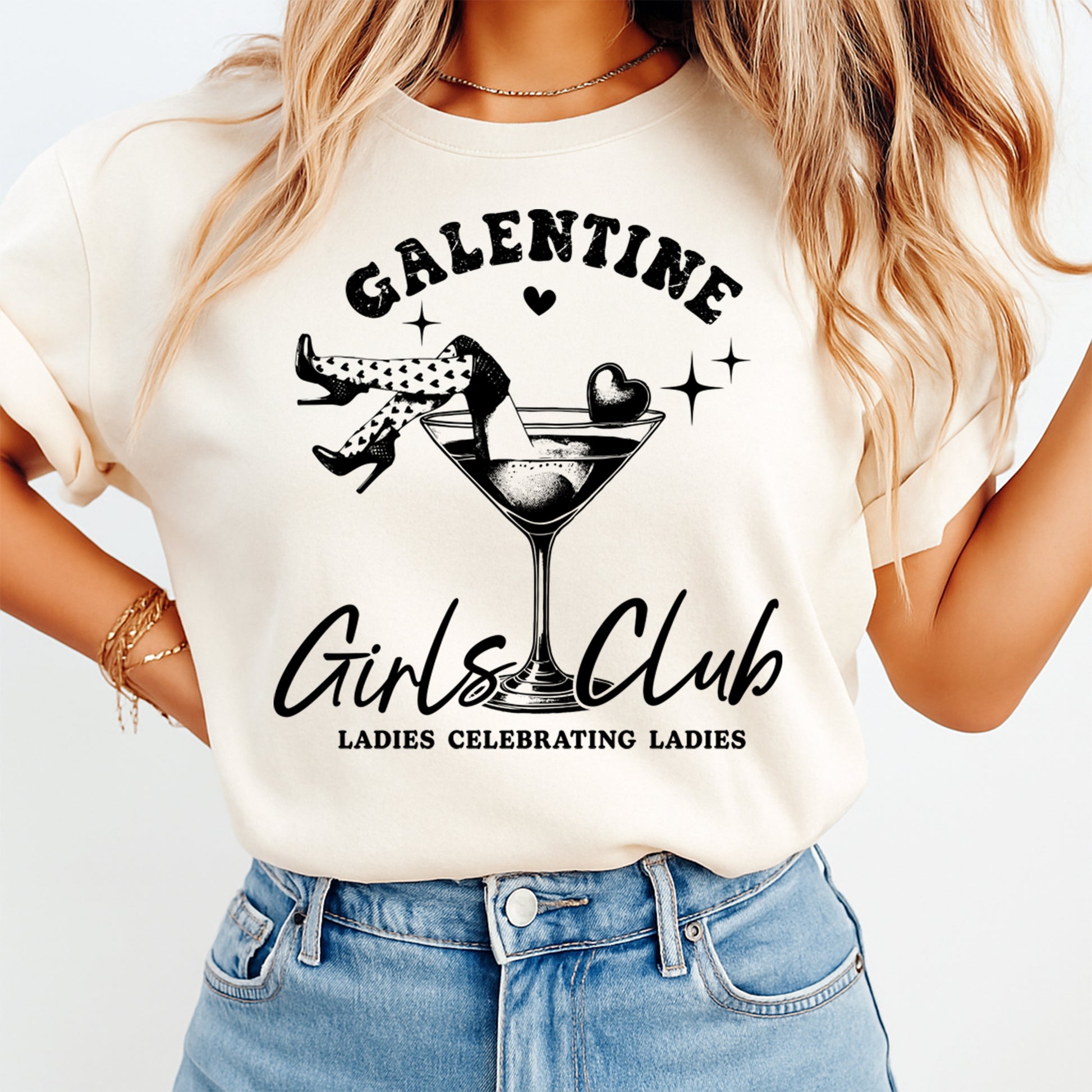 Woman wearing Galentine Girls Club shirt with black martini glass graphic and ladies celebrating ladies quote