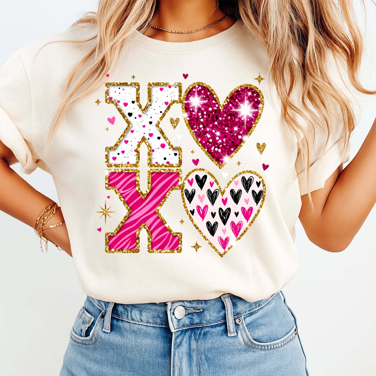 XOXO glitter heart Valentine graphic printed on cream shirt with pink and gold accents