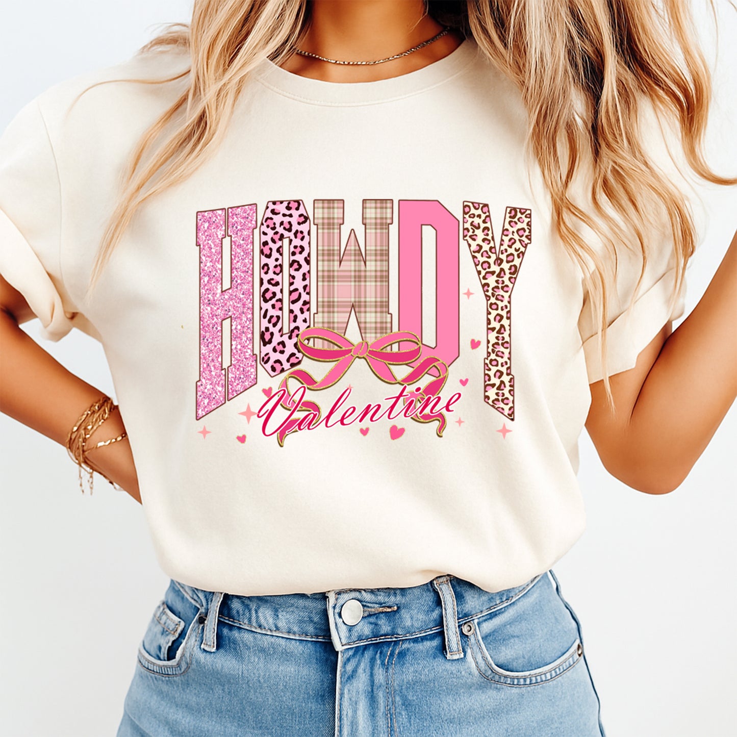 Howdy Valentine western pink glitter and leopard graphic printed on cream shirt with bow detail