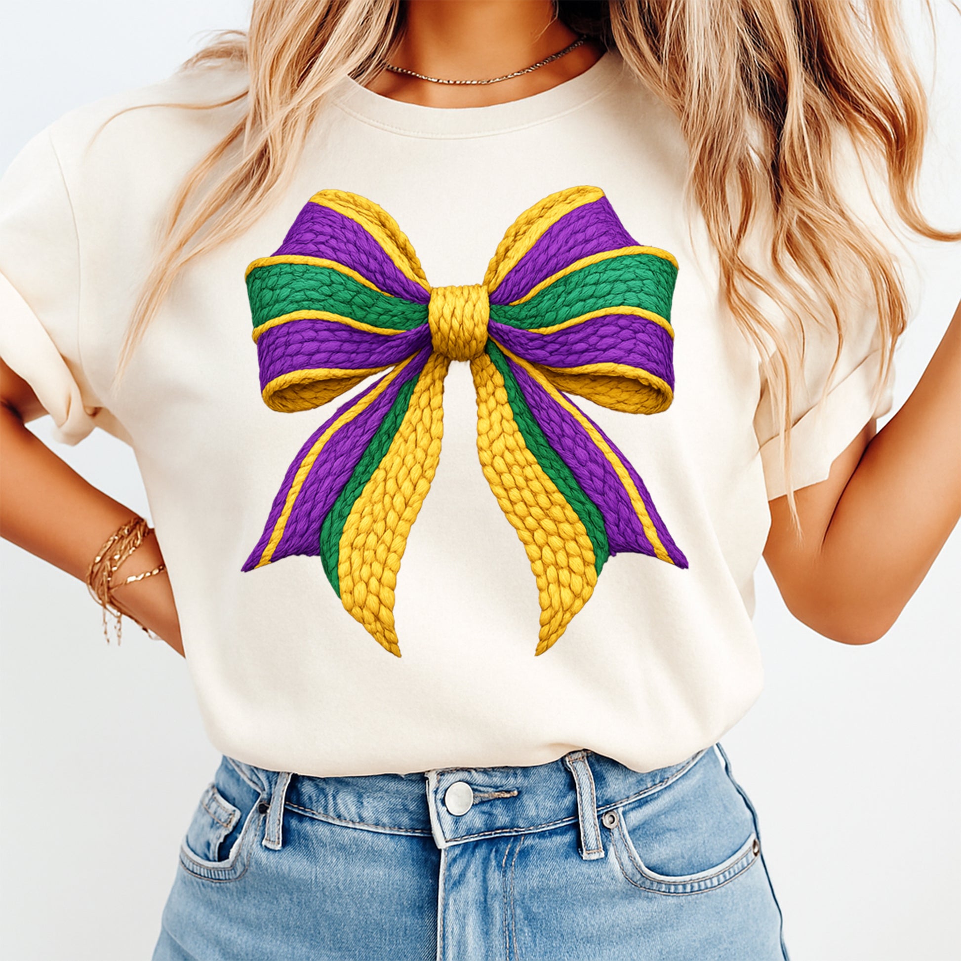 Purple green gold Mardi Gras bow graphic printed on cream shirt for parade outfit