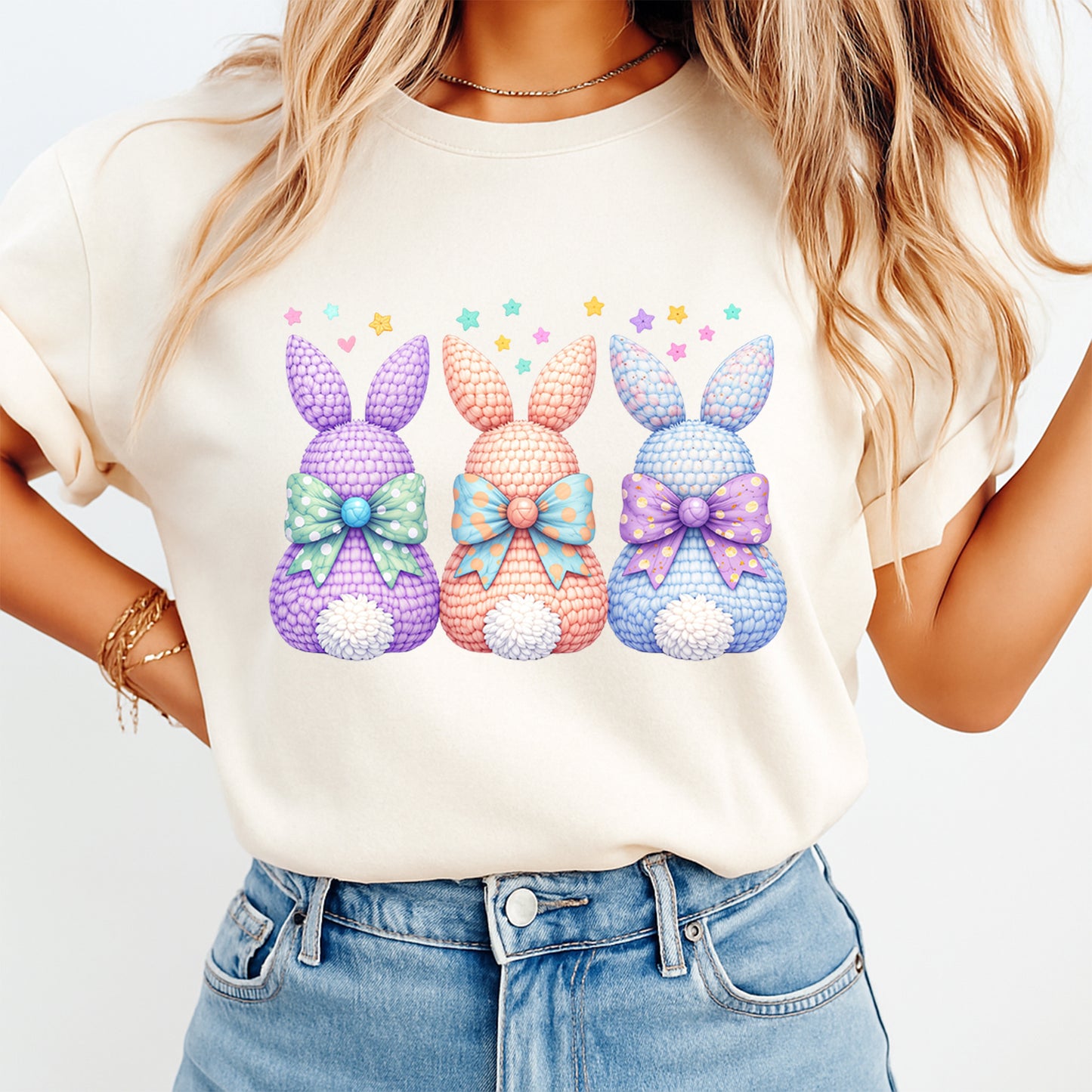 Three pastel bunny silhouettes with bows printed on cream shirt for Easter outfit