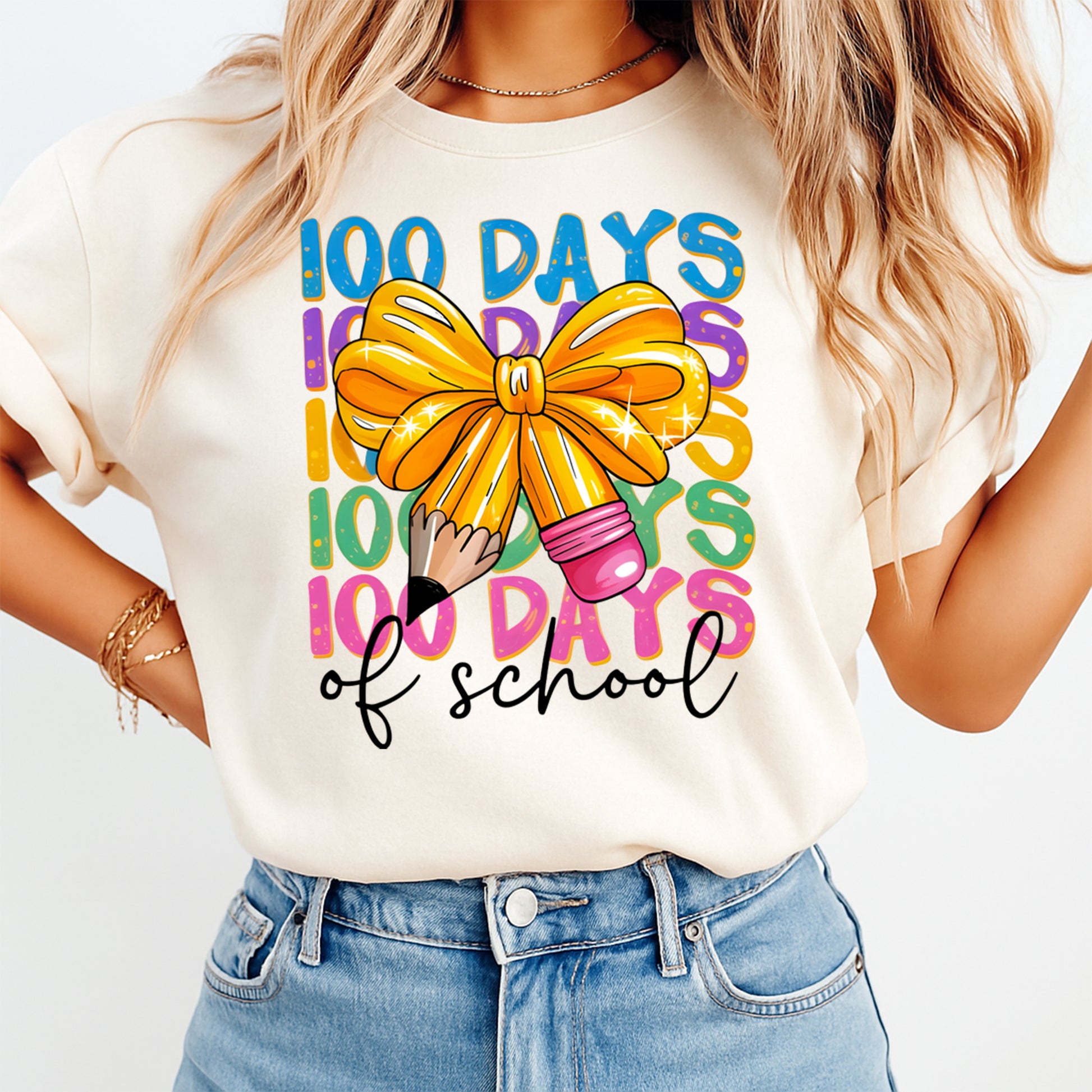 100 days of school yellow bow pencil graphic tee mockup showing colorful classroom celebration shirt design