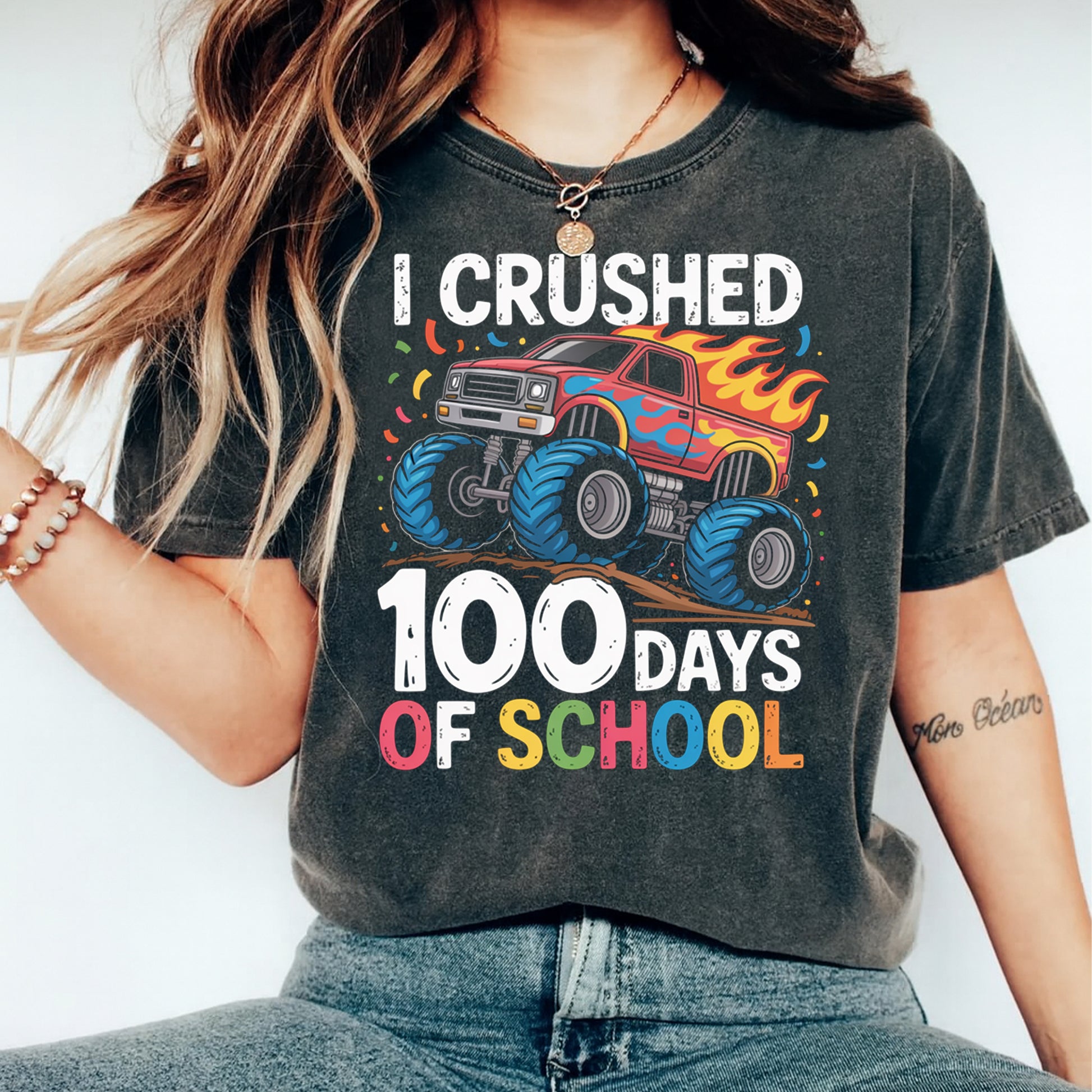 woman wearing i crushed 100 days of school monster truck graphic shirt ready to press dtf heat transfer