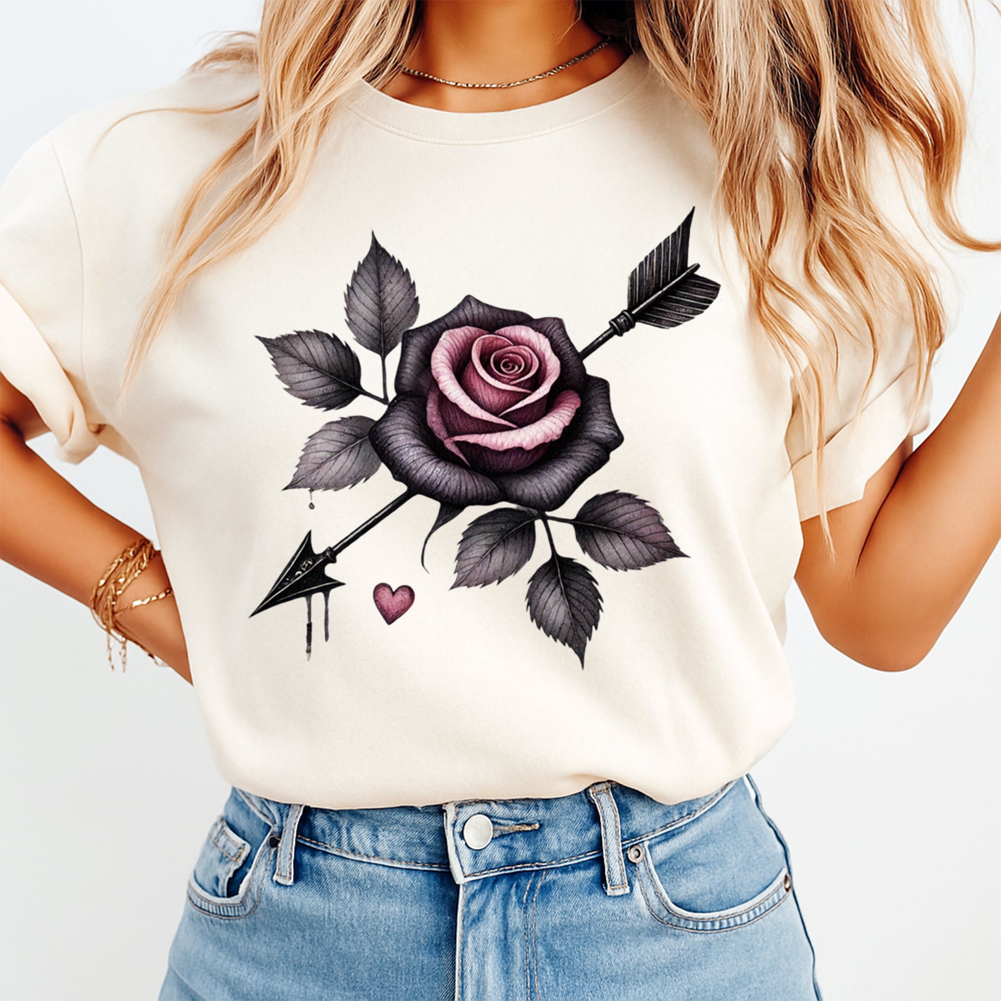 cream shirt with gothic rose arrow design ready to press dtf transfer applied on apparel