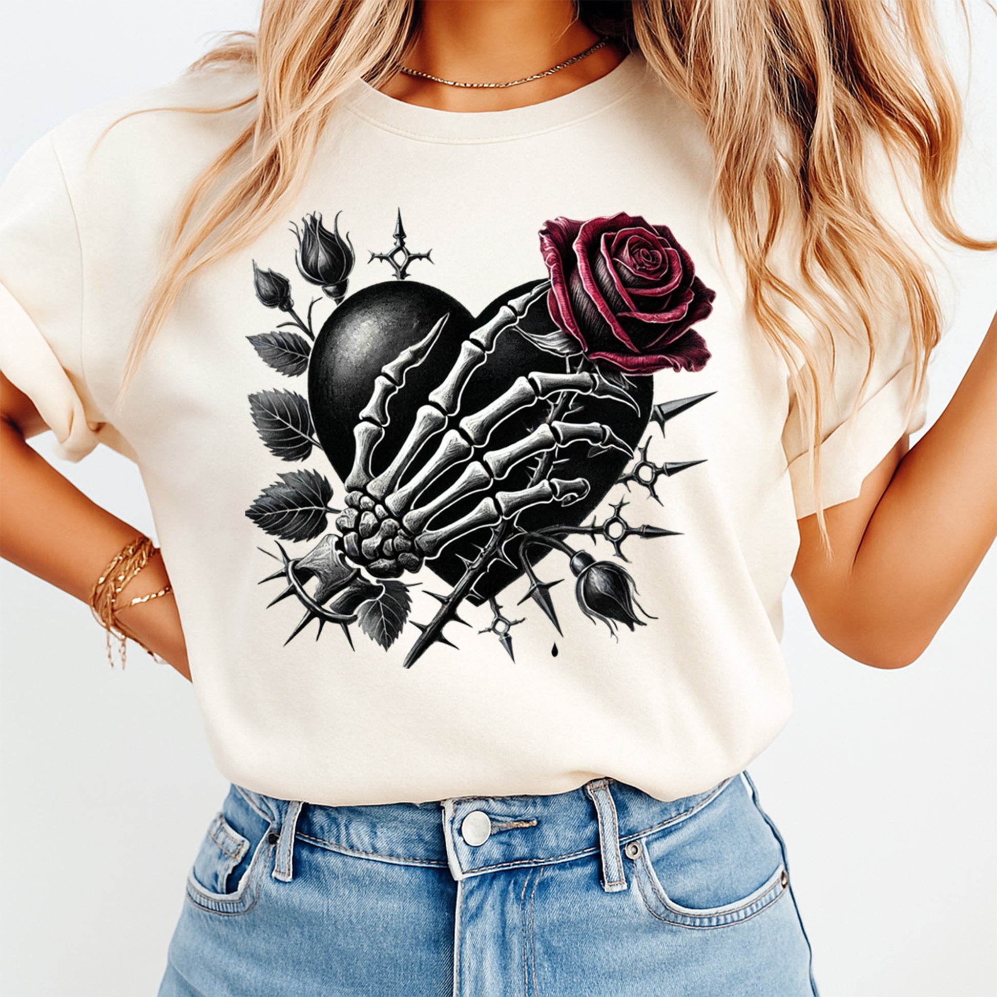 cream shirt with gothic skeleton hand heart rose design ready to press dtf transfer applied on apparel