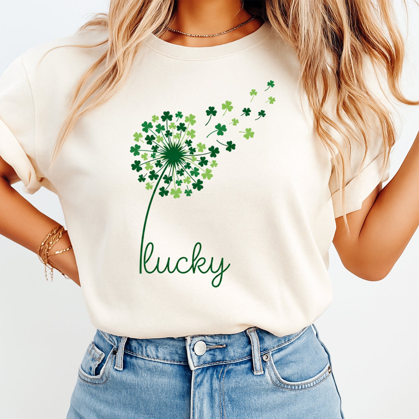 woman wearing shirt with lucky clover dandelion shamrock design ready to press dtf transfer applied