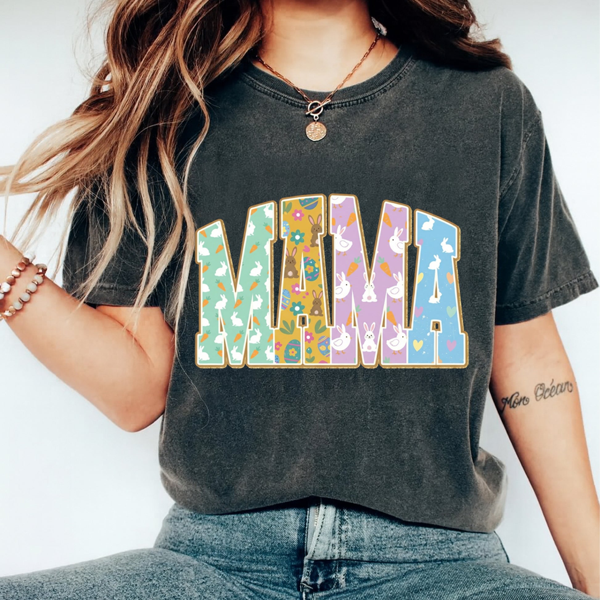 woman wearing mama easter pastel bunny floral shirt ready to press dtf transfer applied on dark tee