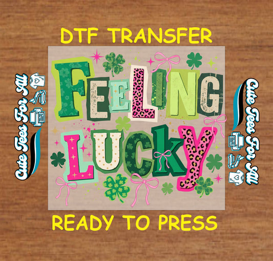feeling lucky shamrock bow st patrick ready to press dtf transfer iron on heat transfer with green letters pink bows and clover graphics