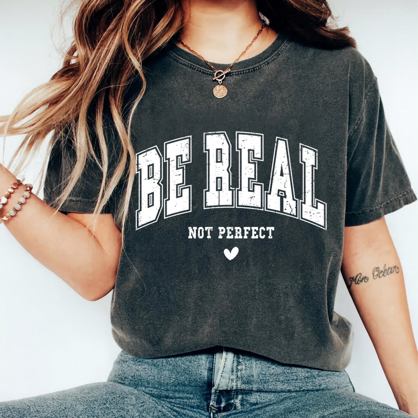 Dark shirt mockup featuring be real not perfect ready to press dtf transfer with bold vintage typography design