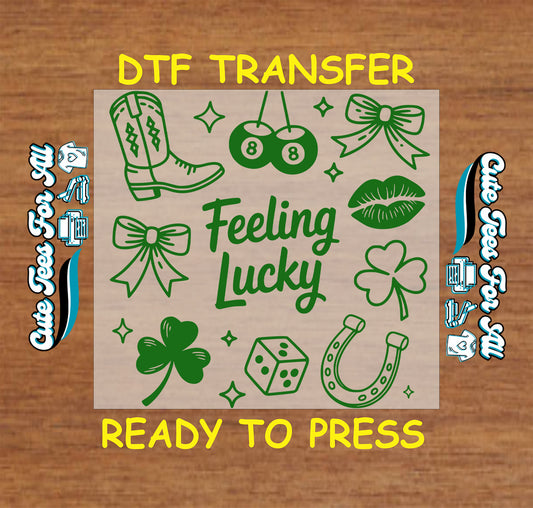 green feeling lucky ready to press dtf transfer with clover icons cowgirl boot dice cherries bows and horseshoe