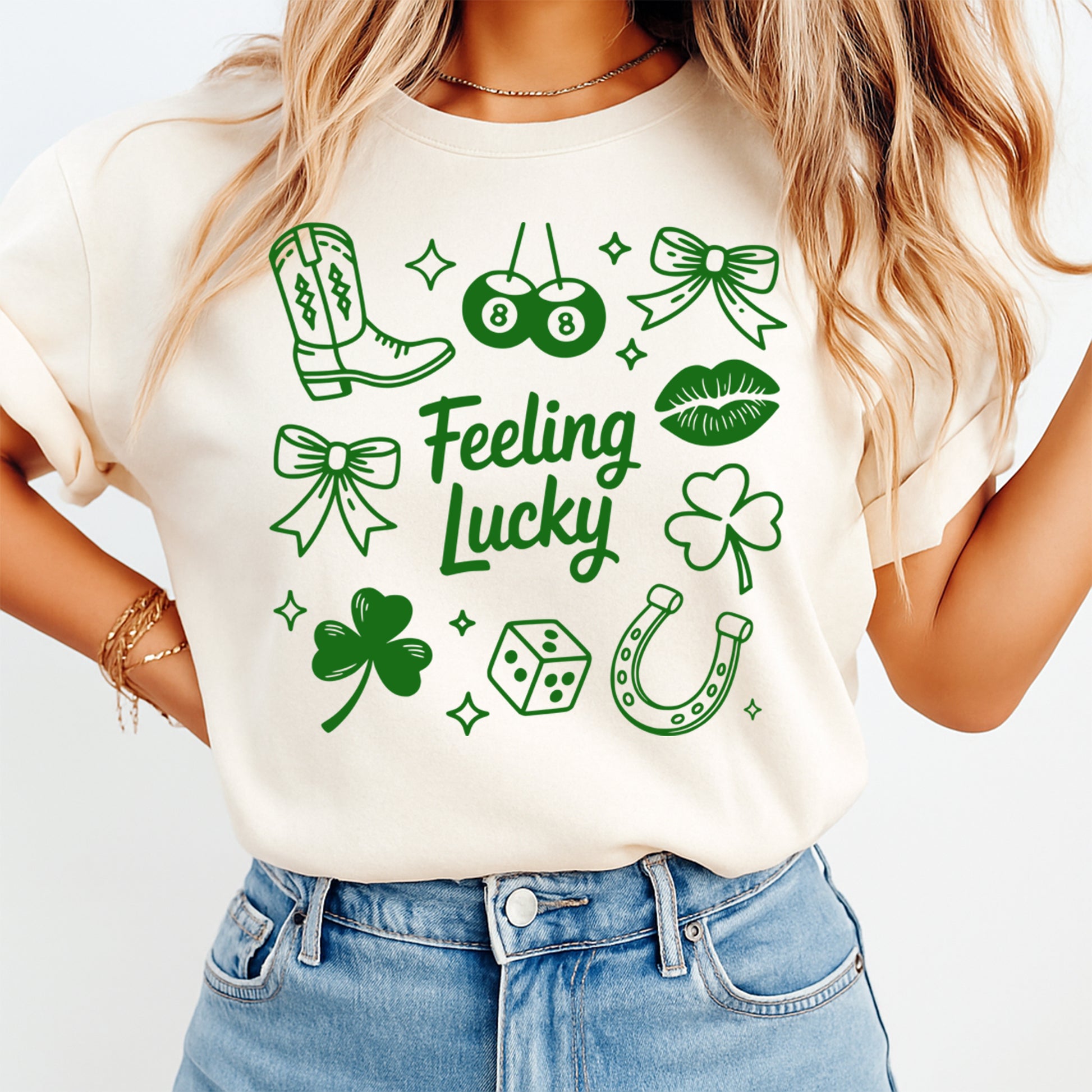 woman wearing beige shirt with green feeling lucky dtf transfer featuring clovers western icons and lucky symbols