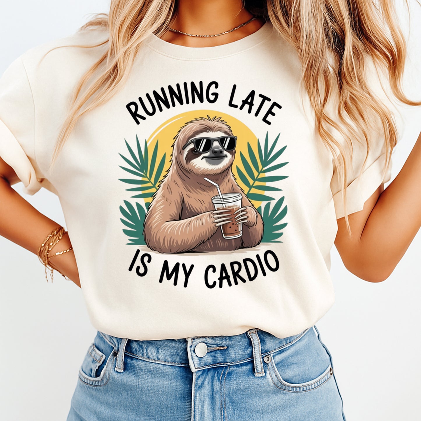 Woman wearing a cream shirt with a funny sloth ready to press dtf graphic featuring sunglasses iced coffee and Running Late Is My Cardio text