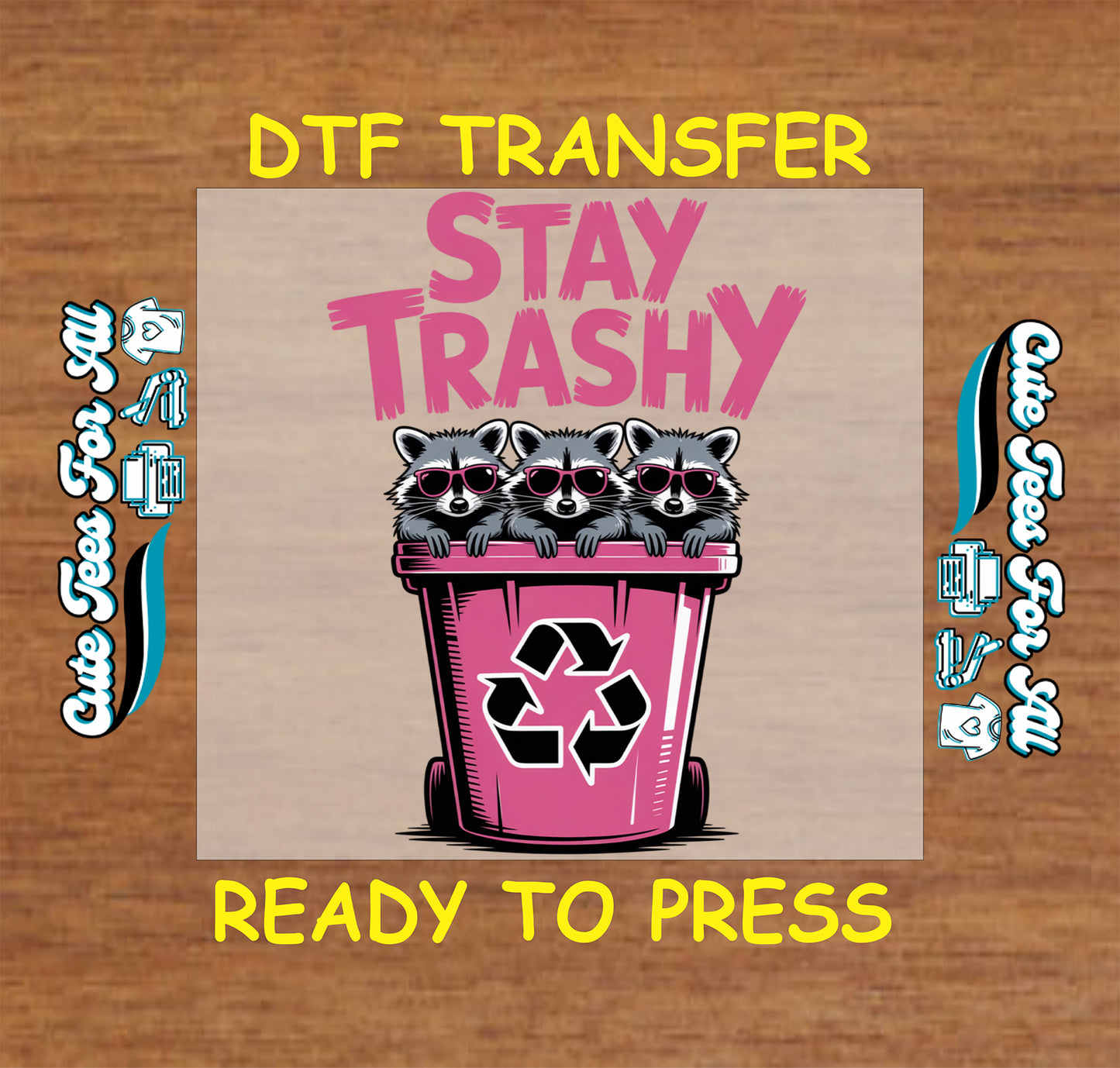 Funny raccoon ready to press dtf transfer with Stay Trashy text, three raccoons in pink sunglasses, and a pink recycling bin on a wood background