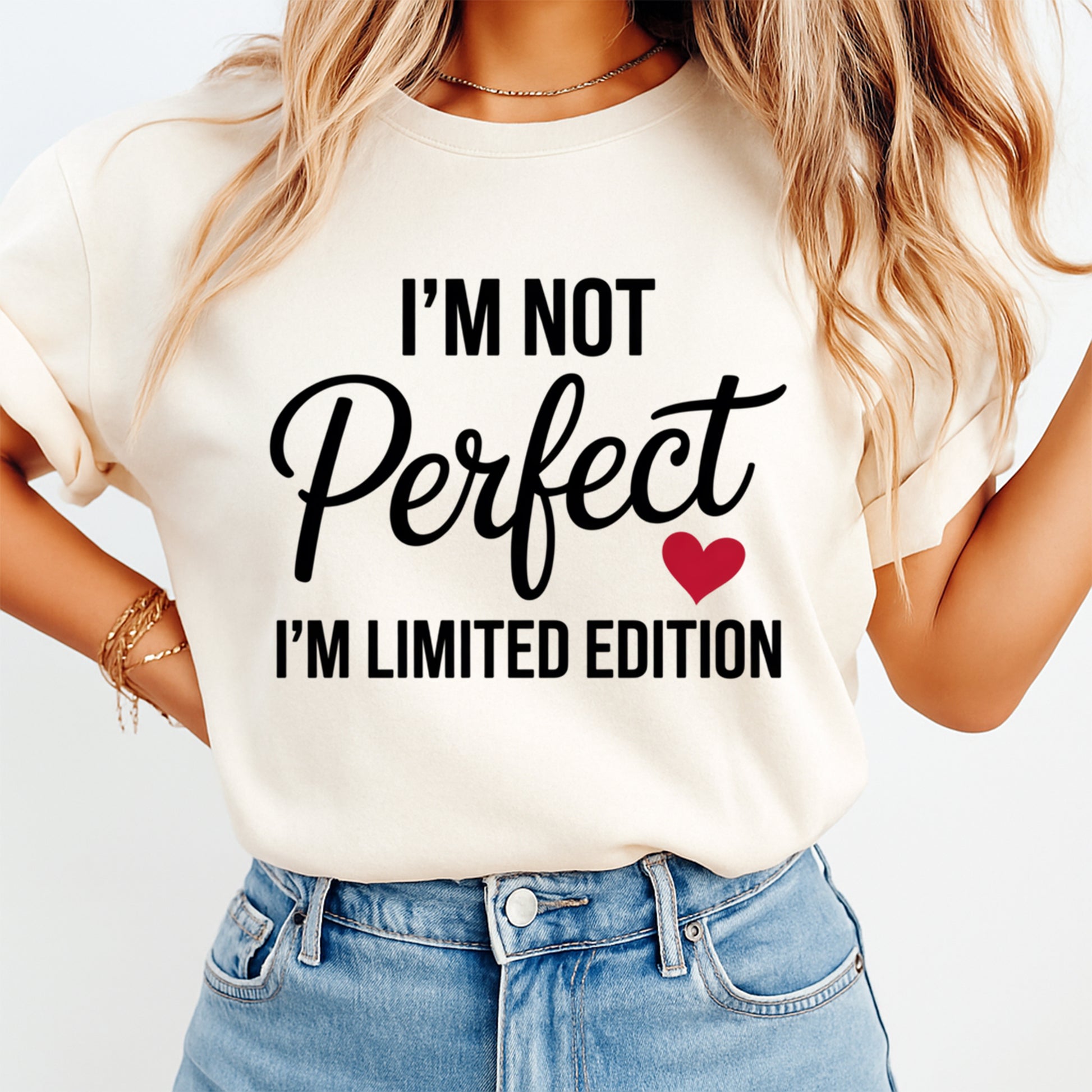 Woman wearing a cream shirt with uplifting limited edition quote and red heart graphic, ready to press dtf mockup