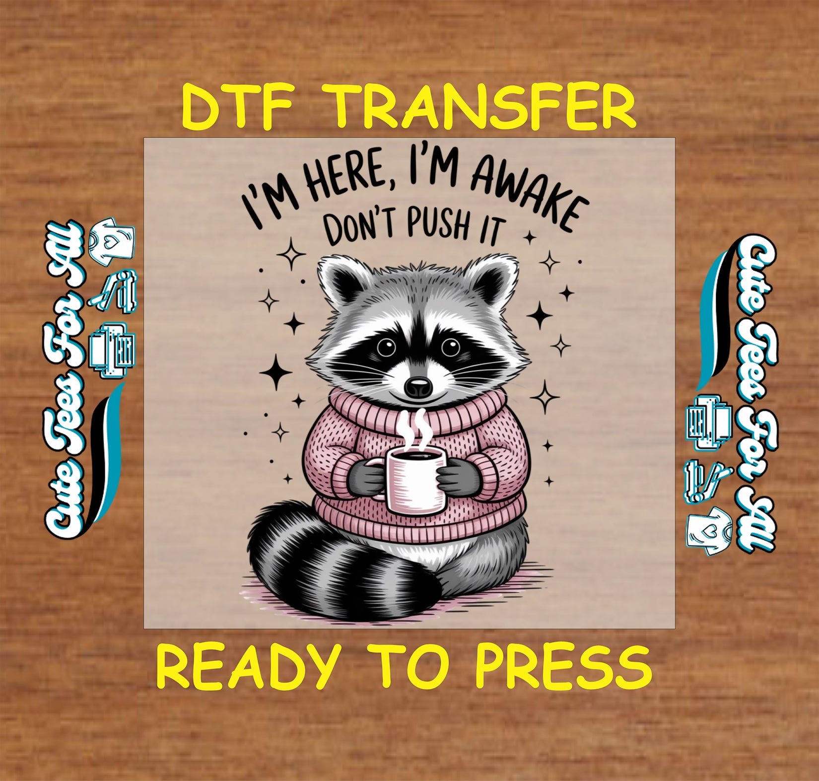 Ready to press DTF transfer artwork of a raccoon in a pink sweater holding coffee with the phrase I’m here I’m awake don’t push it