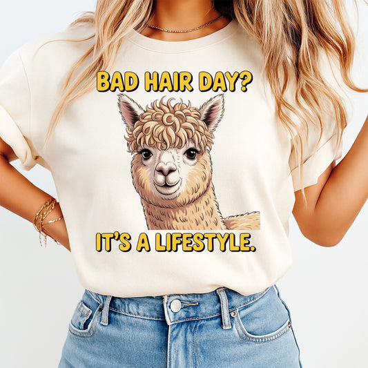 Mockup shirt featuring a fluffy alpaca with curly hair and the phrase Bad Hair Day Its a lifestyle