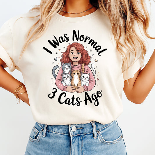 Mockup shirt featuring a woman holding three cats with the phrase I Was Normal 3 Cats Ago
