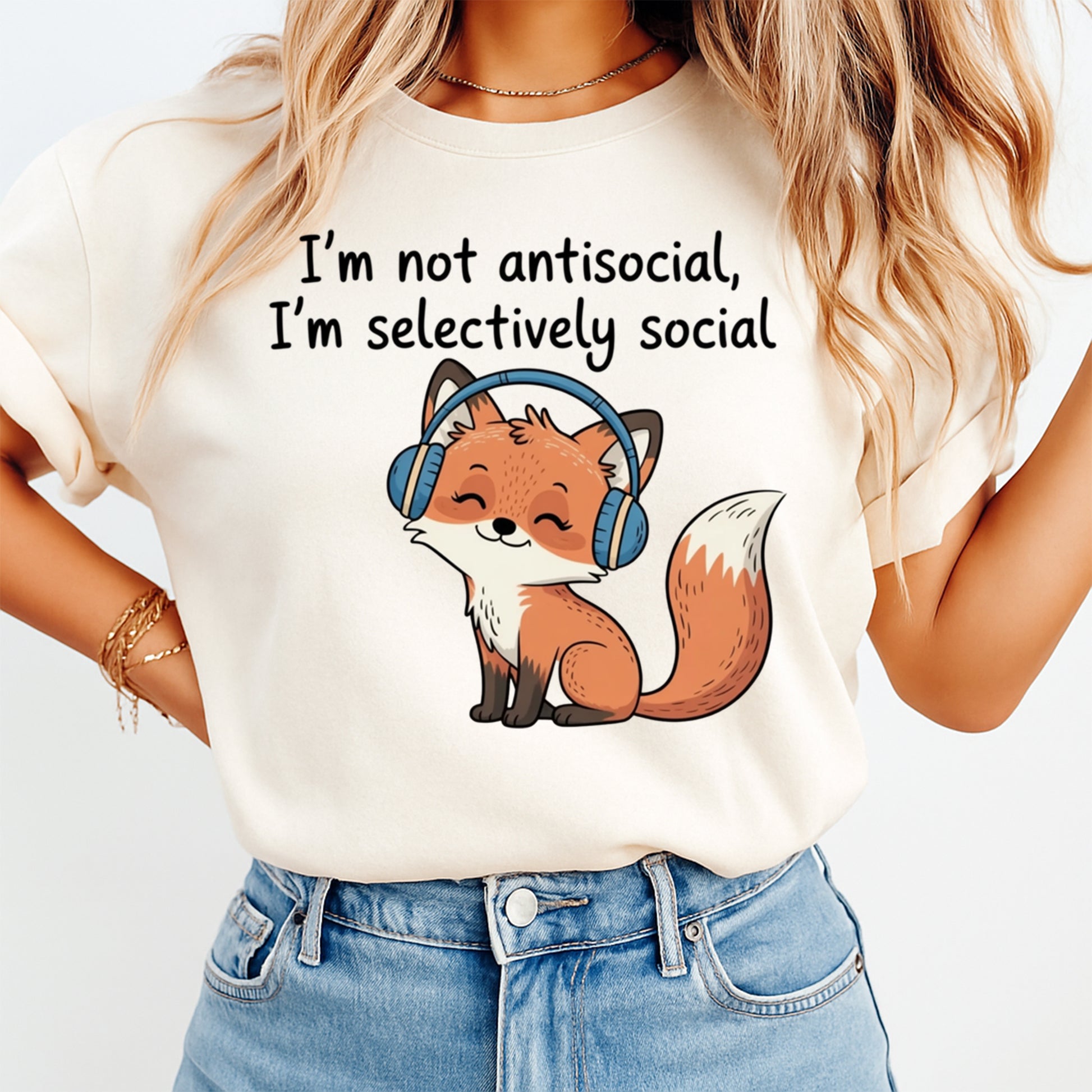 Mockup shirt featuring a cute orange fox wearing blue headphones with the phrase I’m not antisocial I’m selectively social