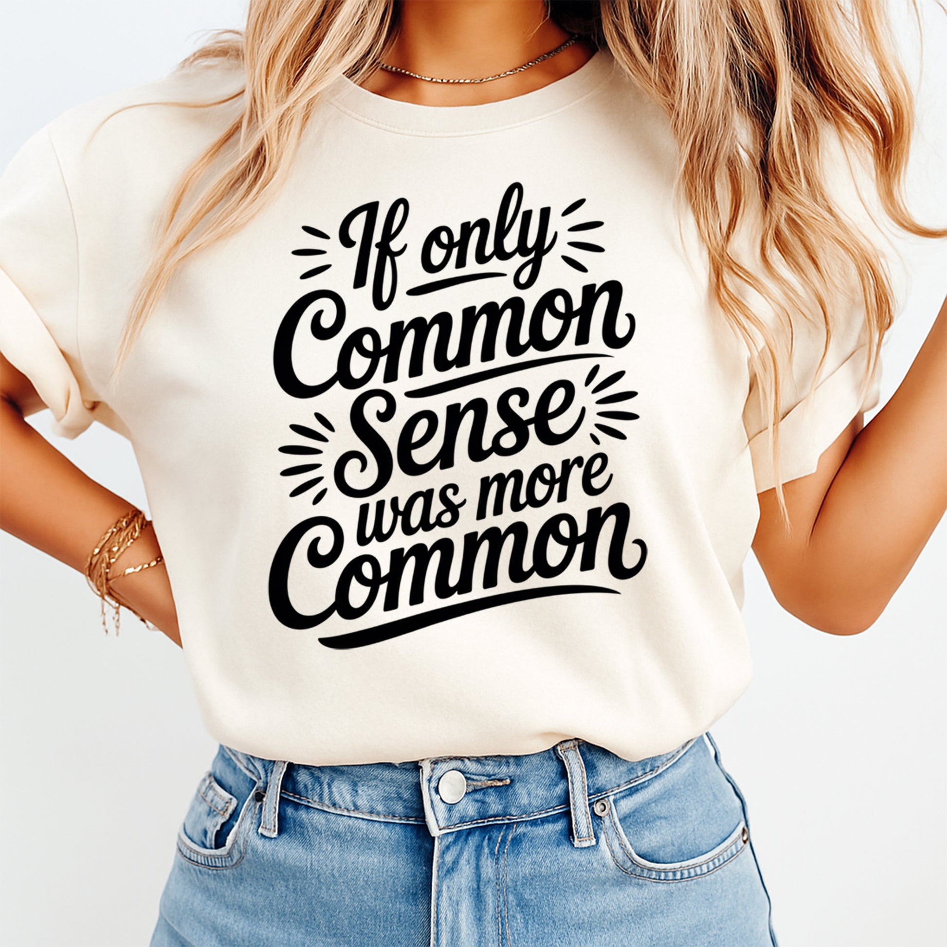 Mockup image of a cream shirt featuring the phrase If only Common Sense was more Common in bold black script