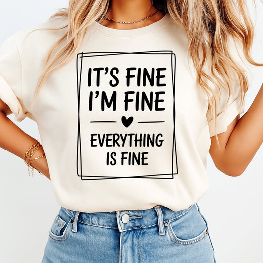 Funny sarcastic quote ready to press dtf transfer mockup on cream shirt with black text reading It’s Fine I’m Fine Everything Is Fine.