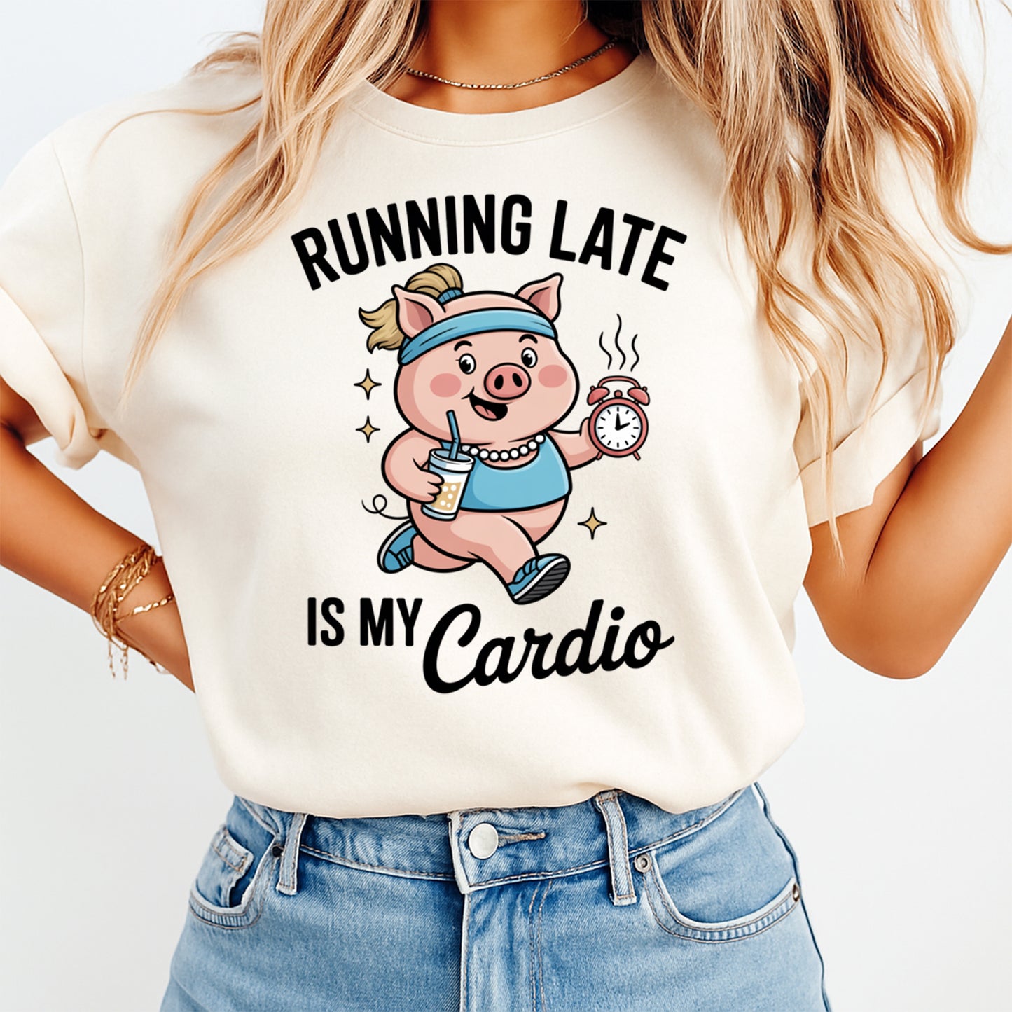 Mockup of a cream shirt featuring a funny pig ready to press dtf transfer with workout gear, iced drink, alarm clock, and the phrase Running Late Is My Cardio.