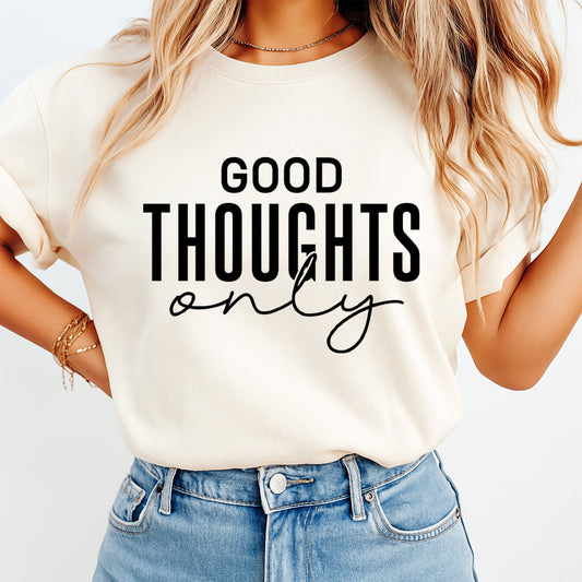 Cream shirt mockup featuring a minimalist positive quote ready to press dtf transfer with the phrase Good Thoughts Only in bold black lettering.