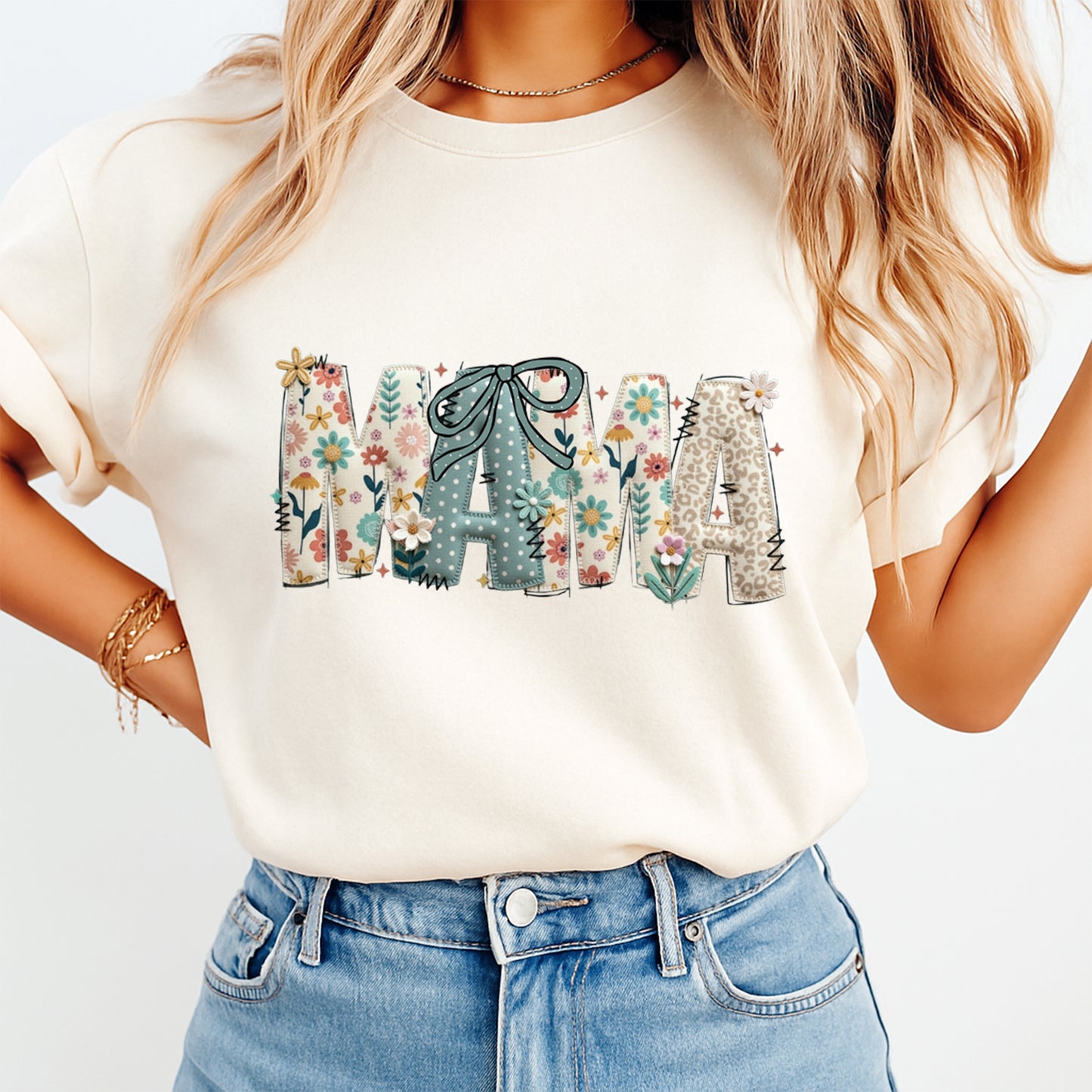 Cream shirt mockup featuring a floral patchwork MAMA ready to press dtf transfer with bow detail for cute mom shirts.