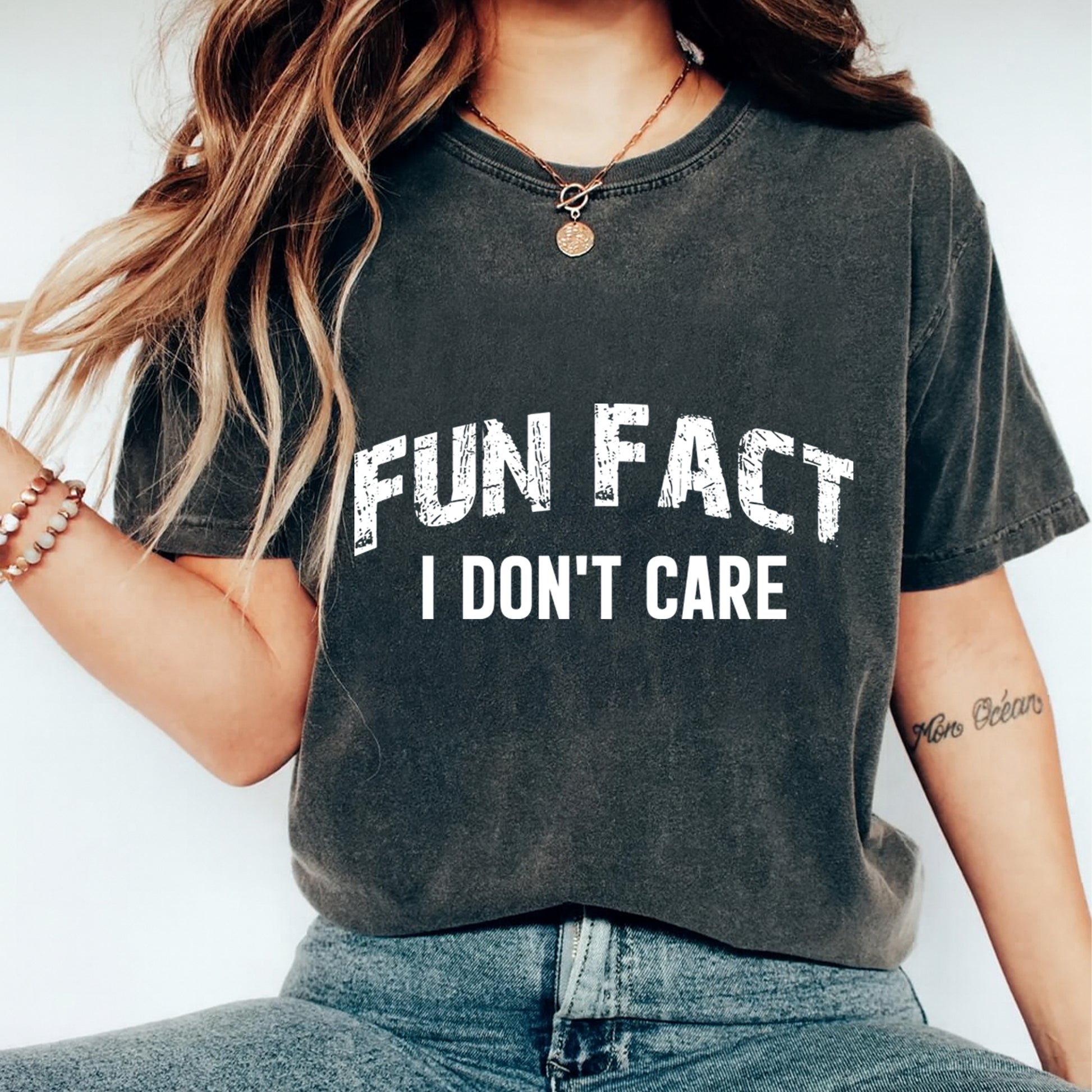 Black shirt mockup featuring a bold white Fun Fact I Don’t Care ready to press dtf transfer for sarcastic DIY shirts.